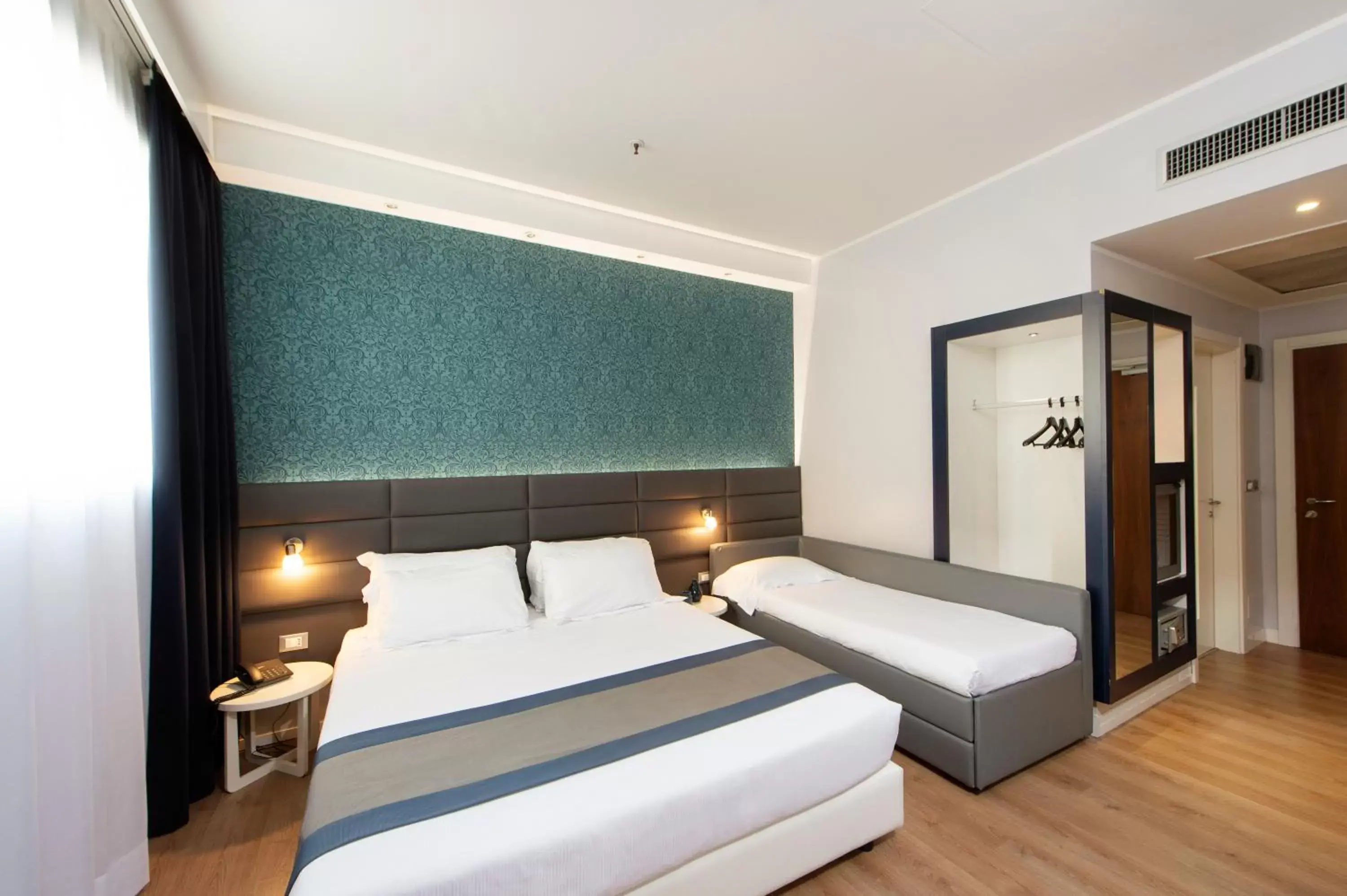 Bed in Neo Hotel Bed in Neo Hotel