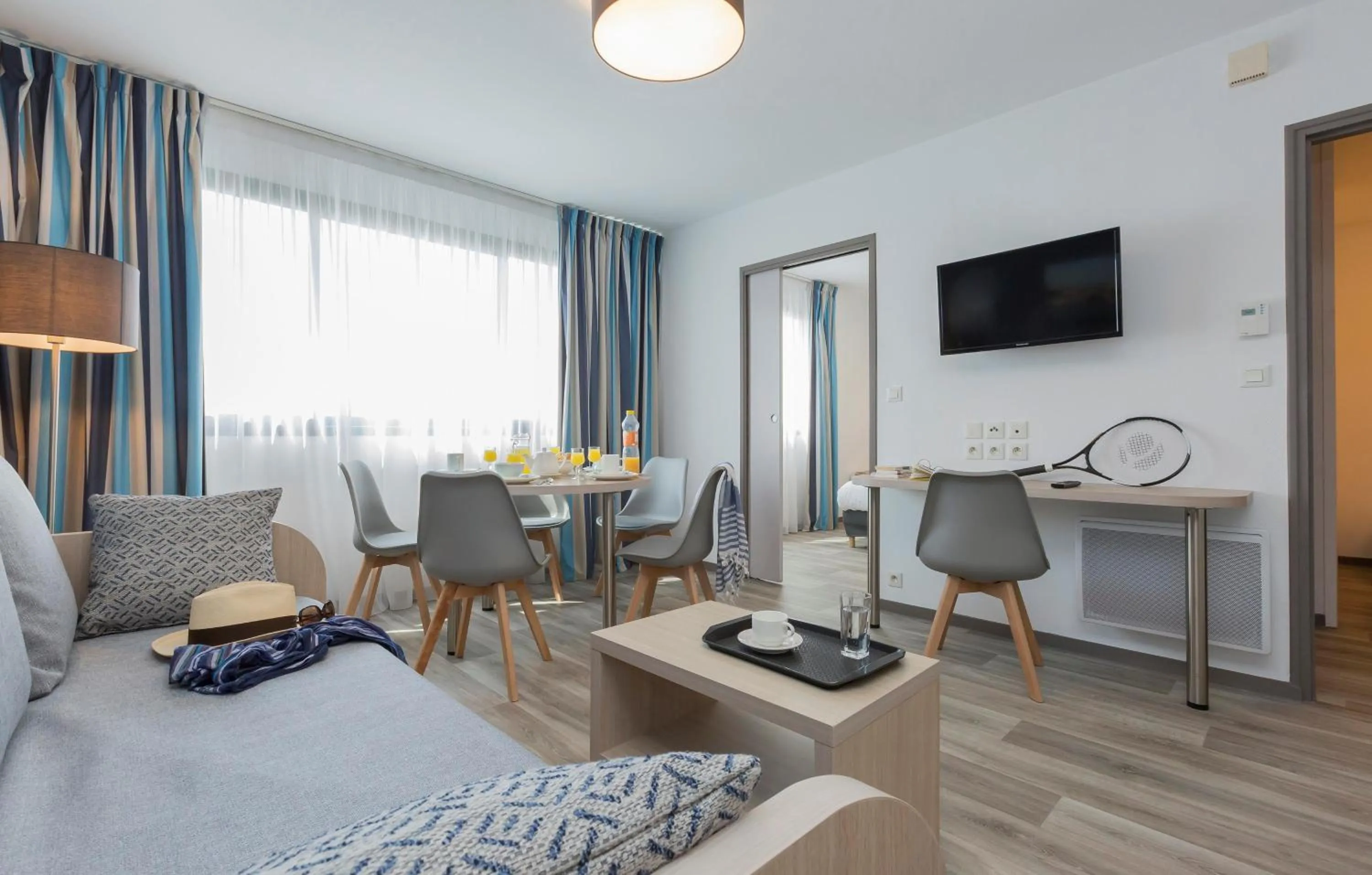 Living room, Bed in Résidence Odalys Archipel