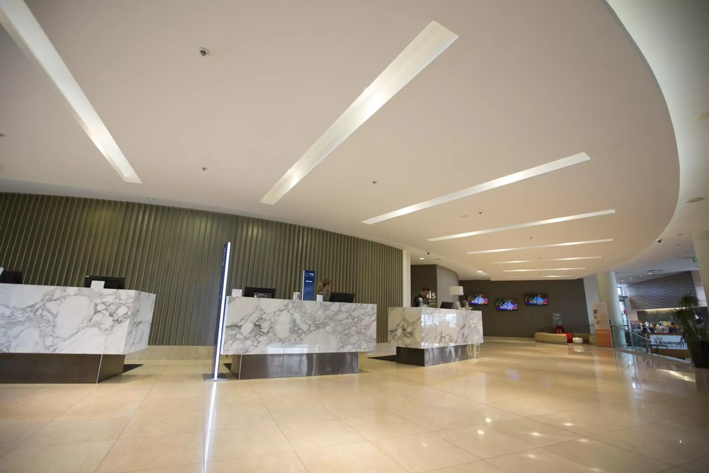 Lobby or reception in Novotel Sydney Olympic Park