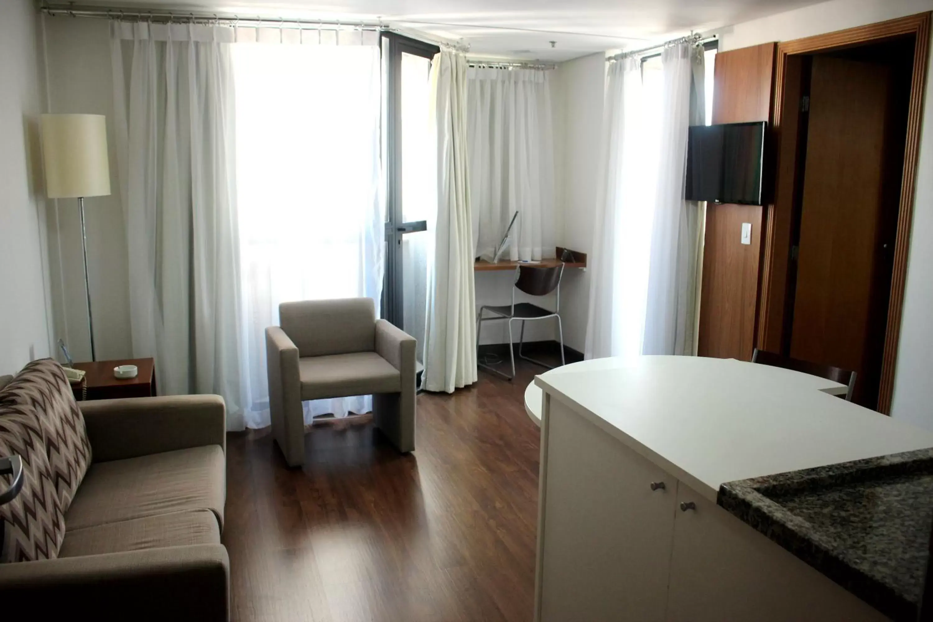 Living room in Aparthotel Twin Towers Living room in Aparthotel Twin Towers