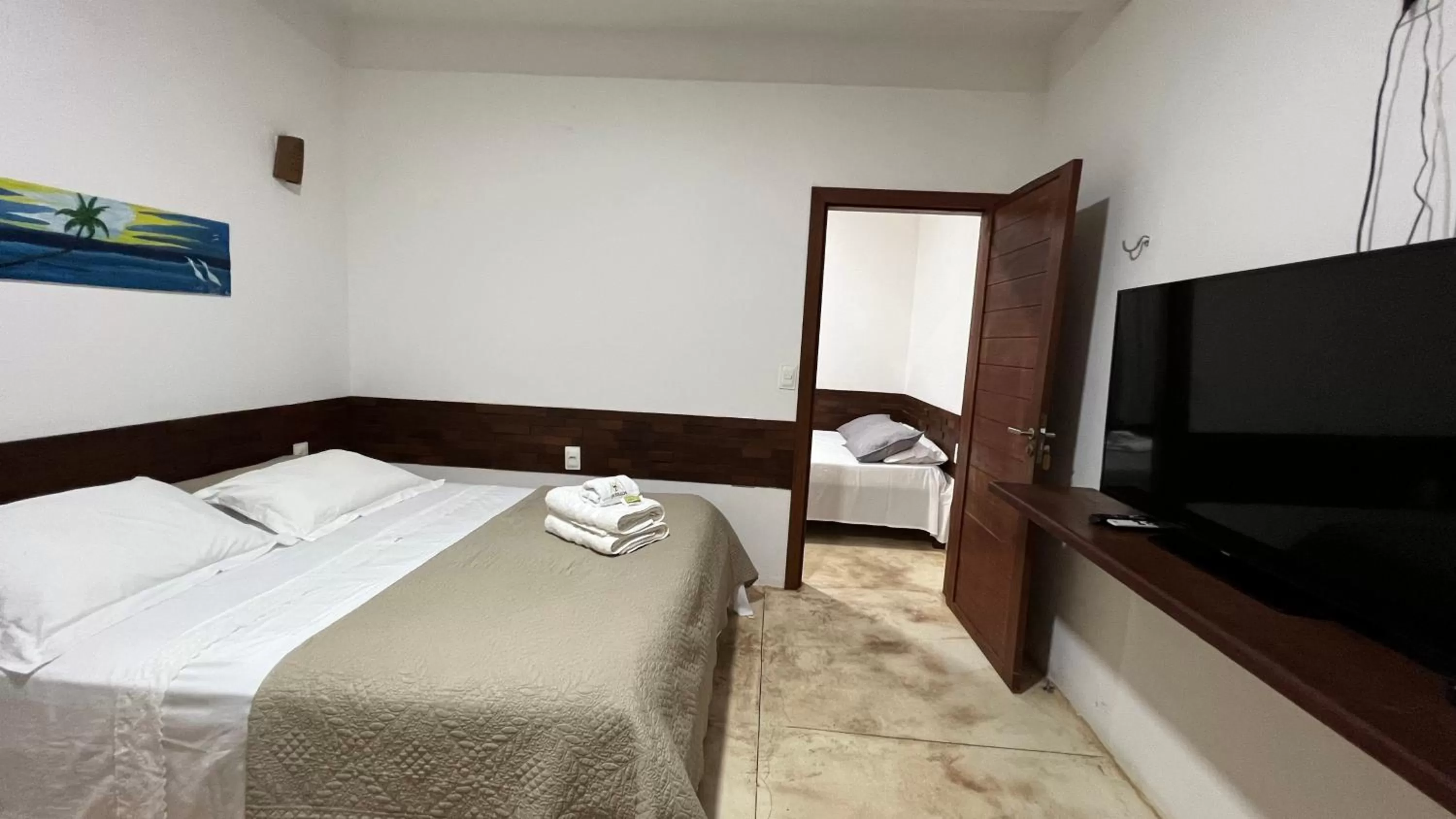 Communal lounge/ TV room in Aki Pousada