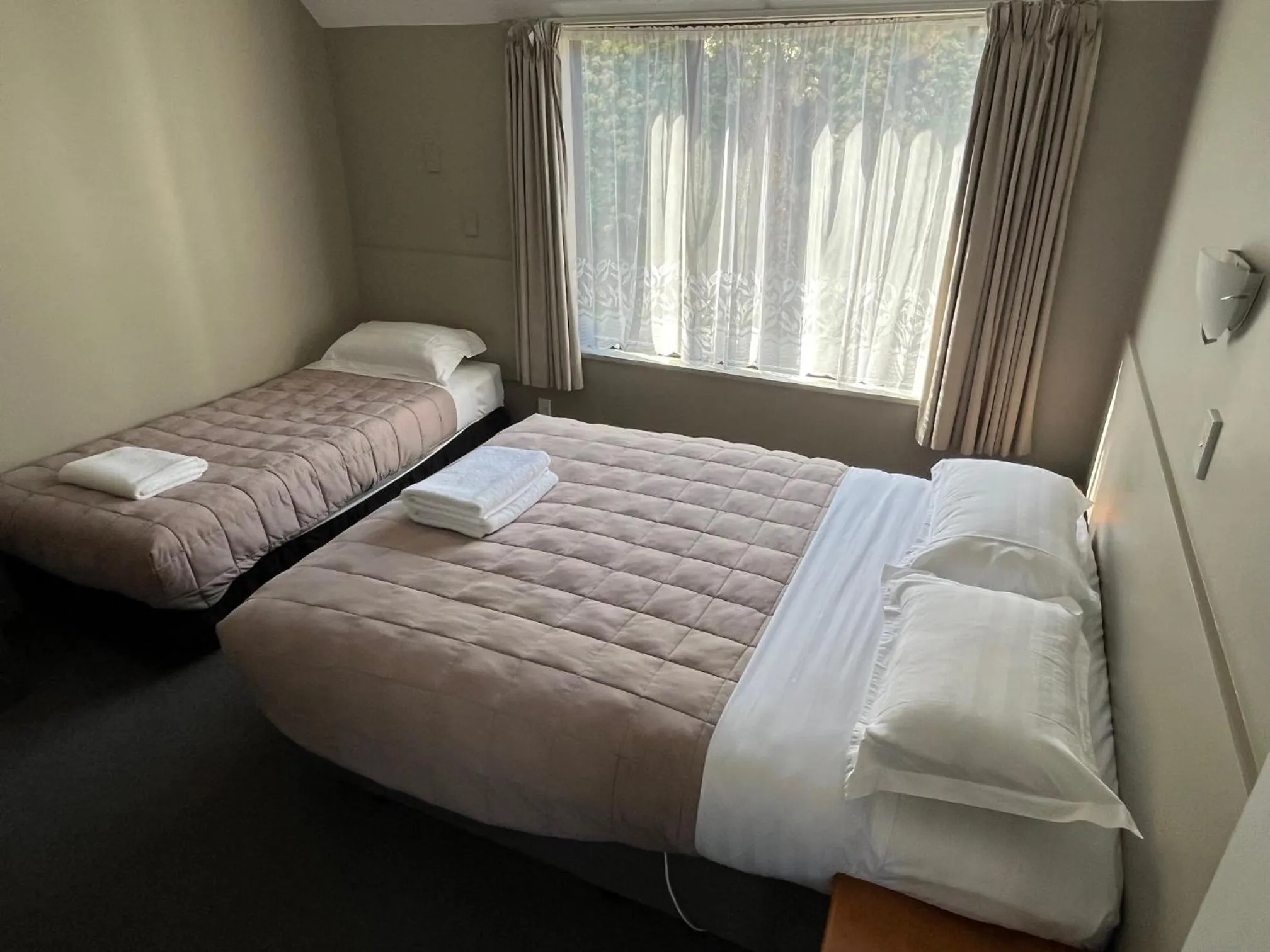 Bed in Manuka Crescent Motel