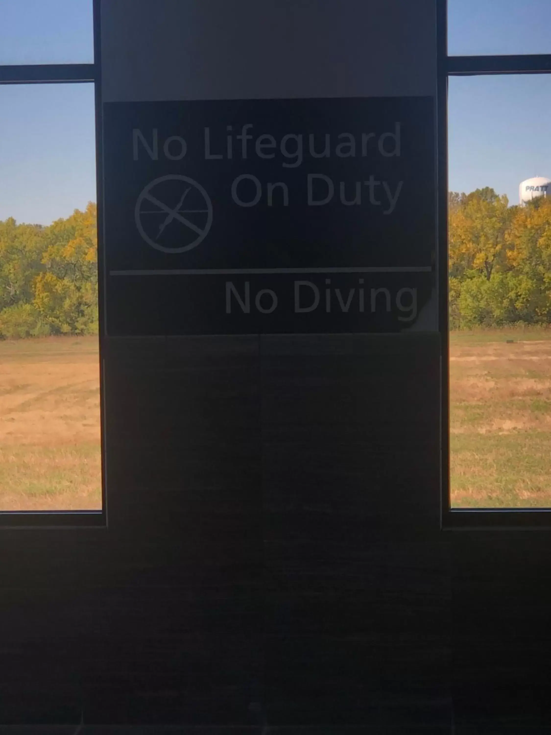 Swimming pool, Property Logo/Sign in Pratt Inn and Suites