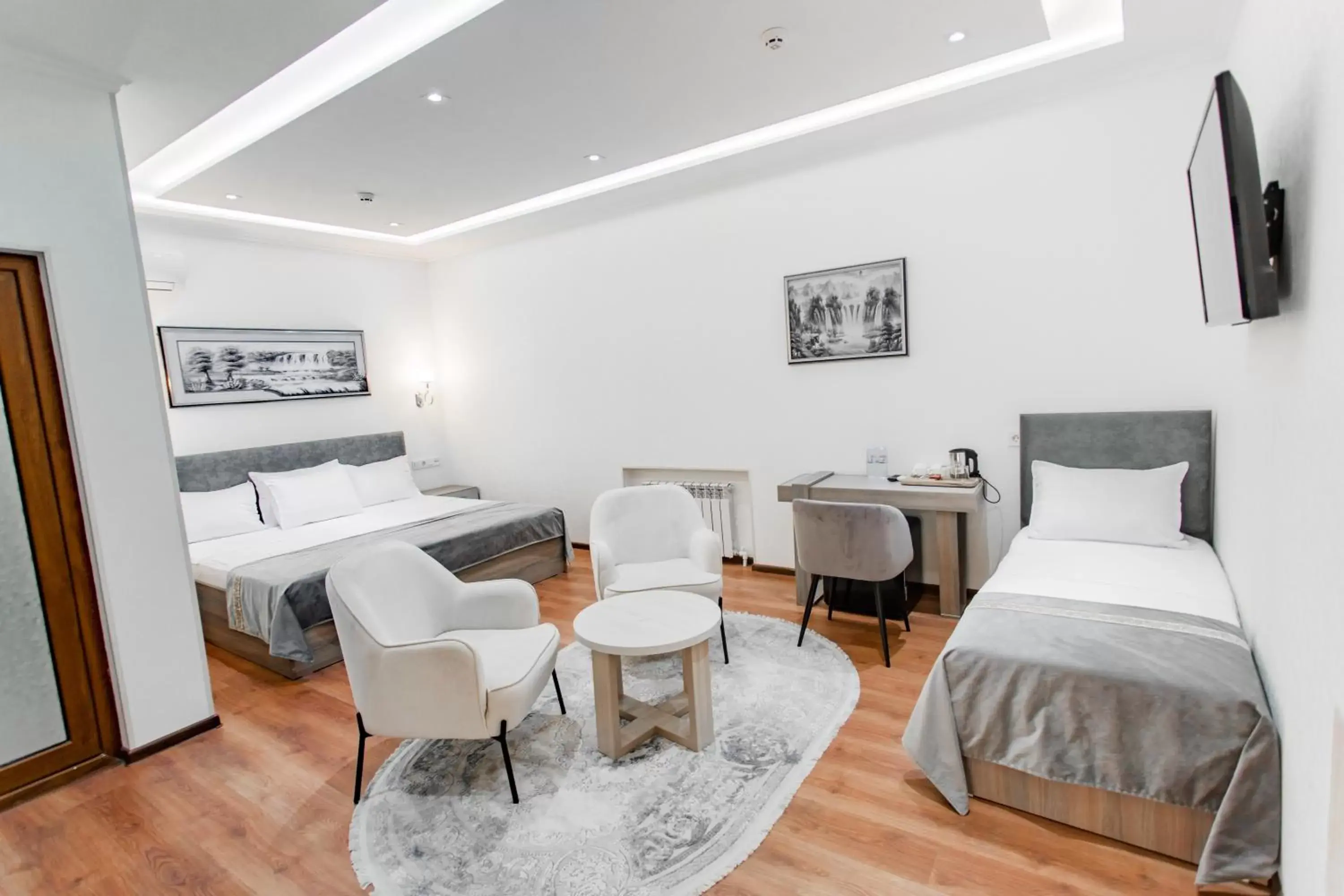 Superior Triple Room in Registon Saroy Hotel Superior Triple Room in Registon Saroy Hotel