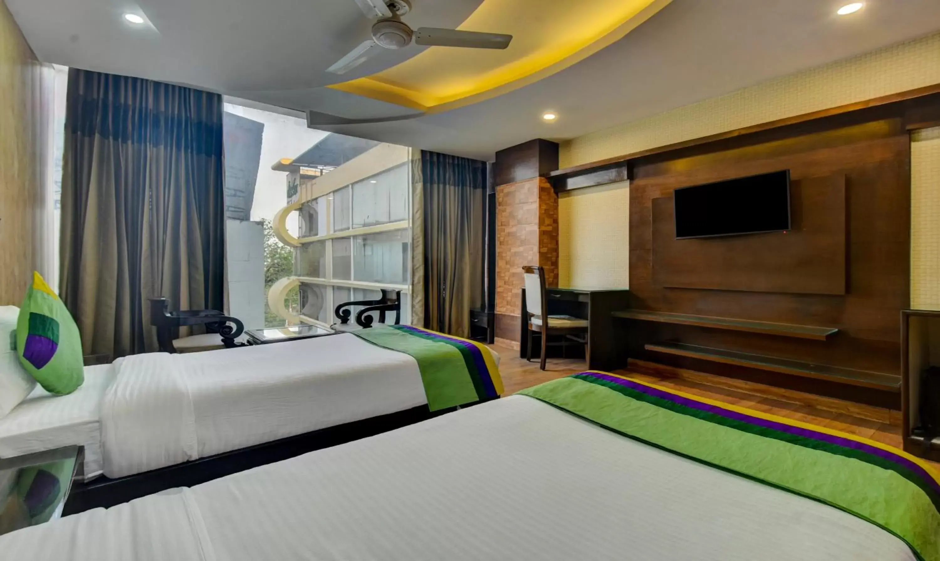 TV and multimedia, Bed in Treebo Elysee, Patel Nagar TV and multimedia, Bed in Treebo Elysee, Patel Nagar