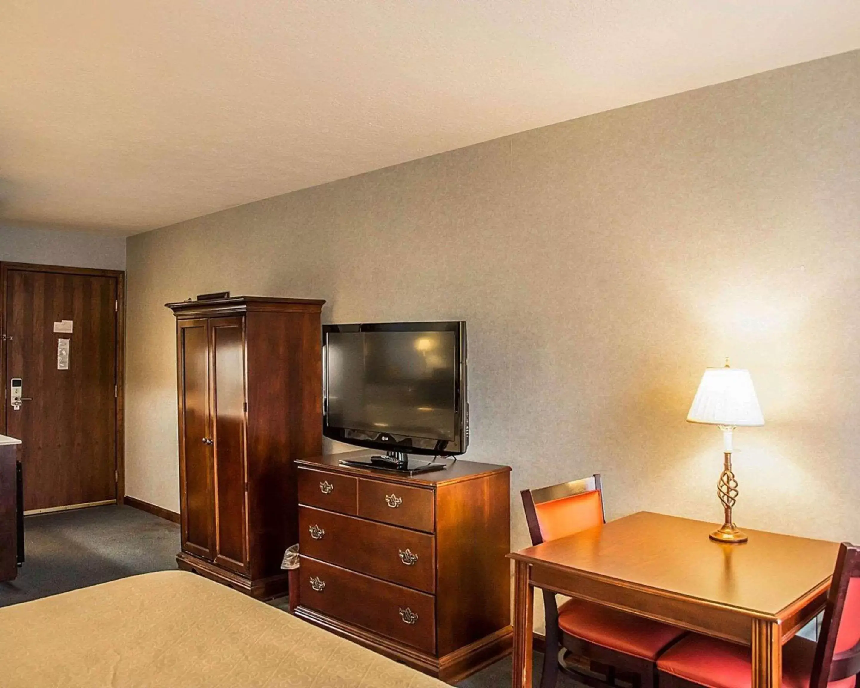 Photo of the whole room, TV/Entertainment Center in Quality Inn & Suites Cincinnati I-275