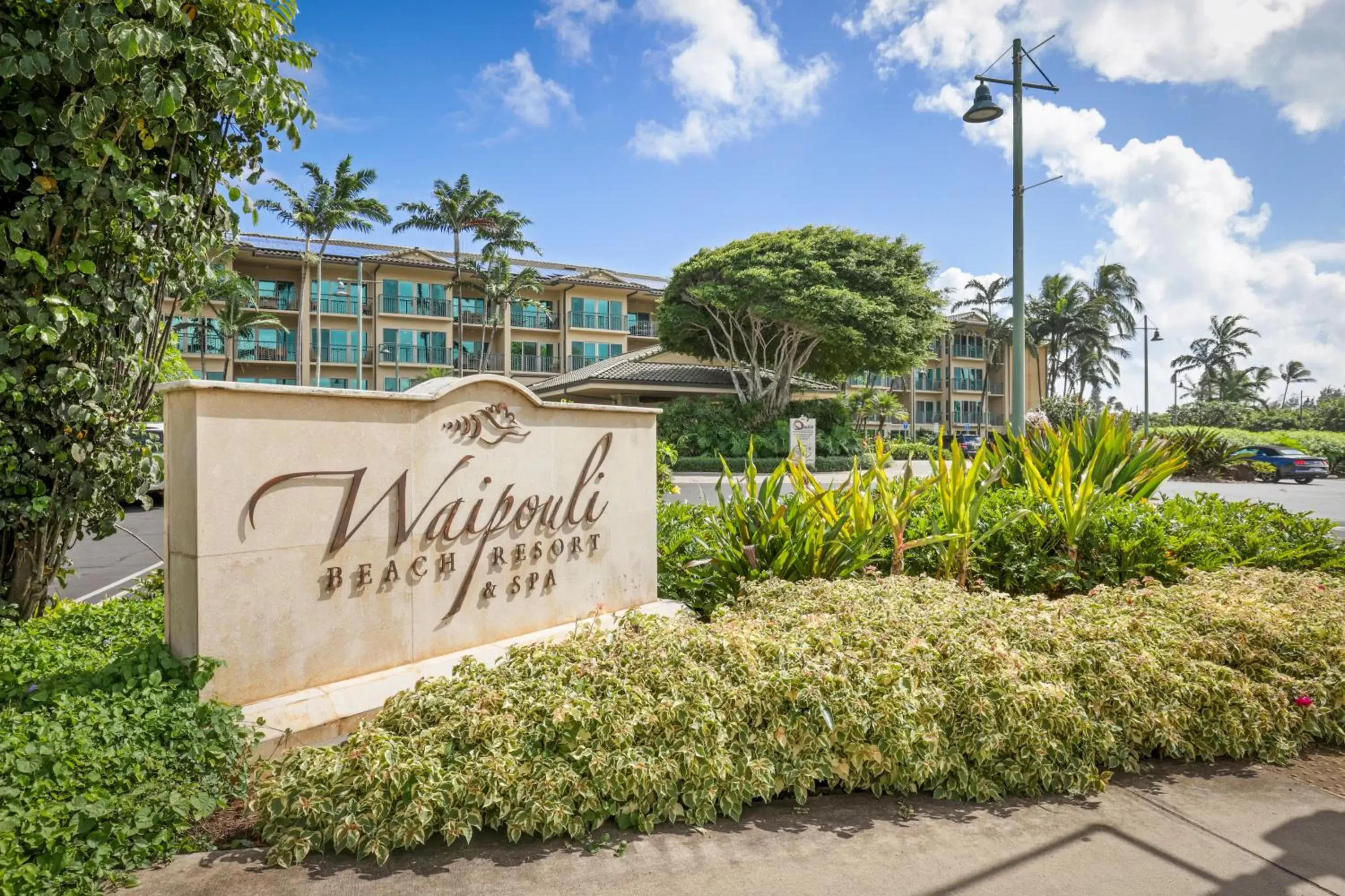 Property building, Property Logo/Sign in Waipouli Beach Resort & Spa Kauai By Outrigger