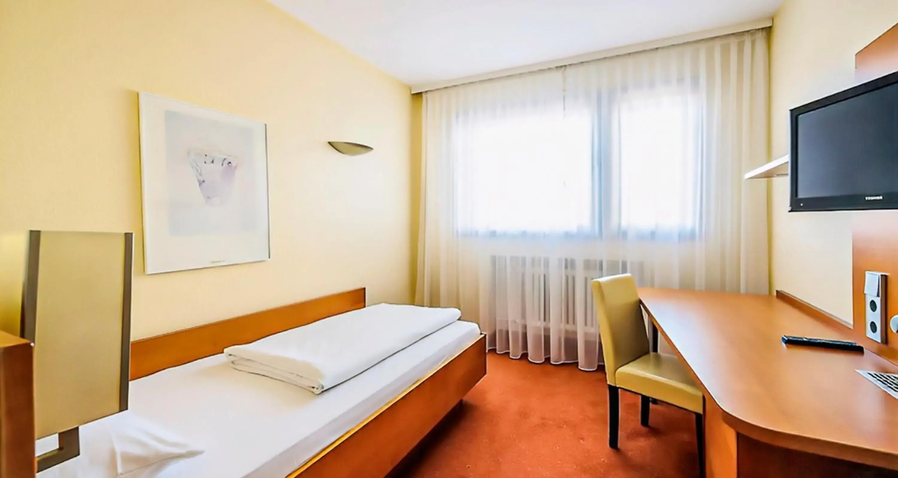 Photo of the whole room in Novum Hotel Rieker Stuttgart Hauptbahnhof   