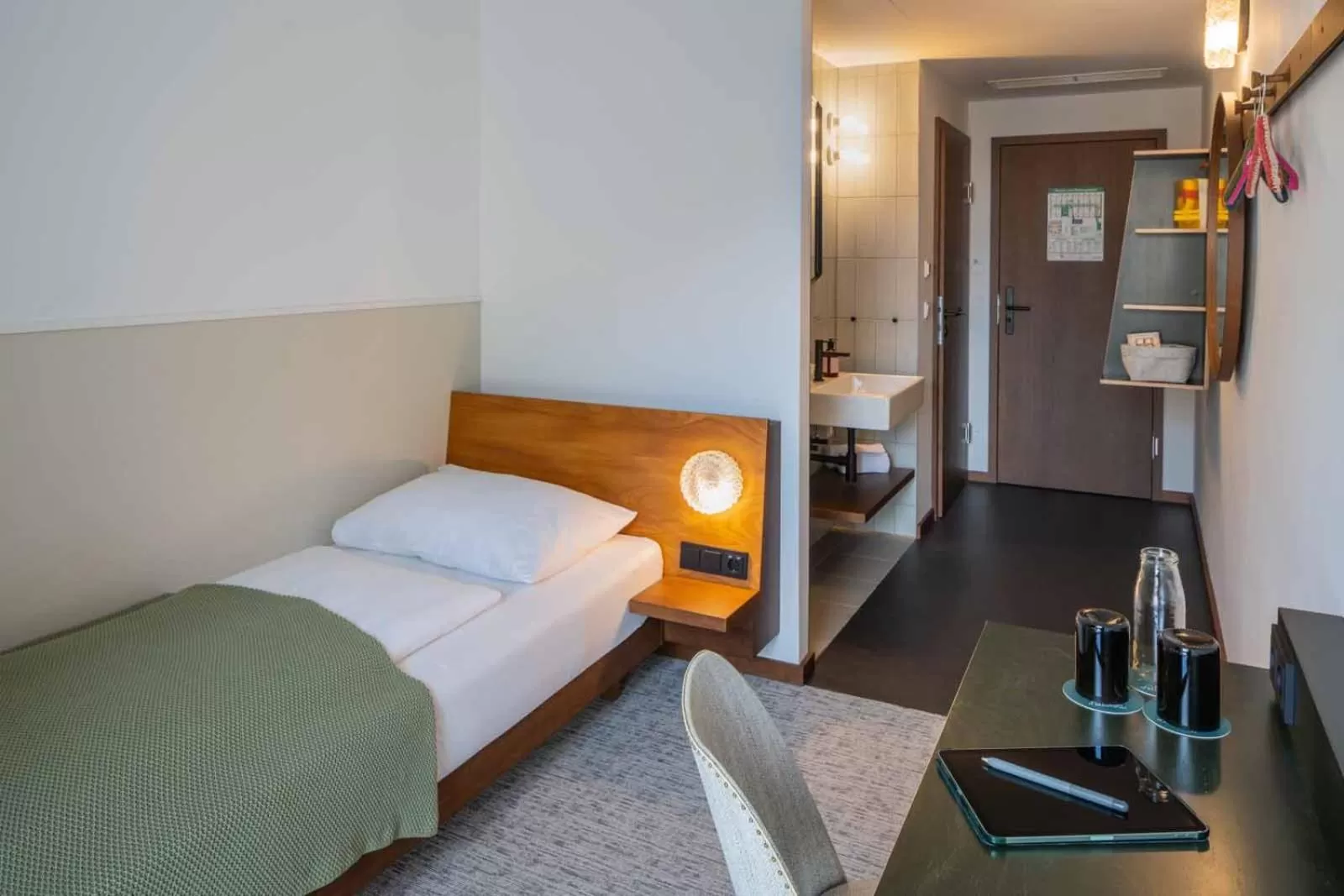 Photo of the whole room, Bed in magdas HOTEL Vienna City - First Social Business HOTEL in Austria
