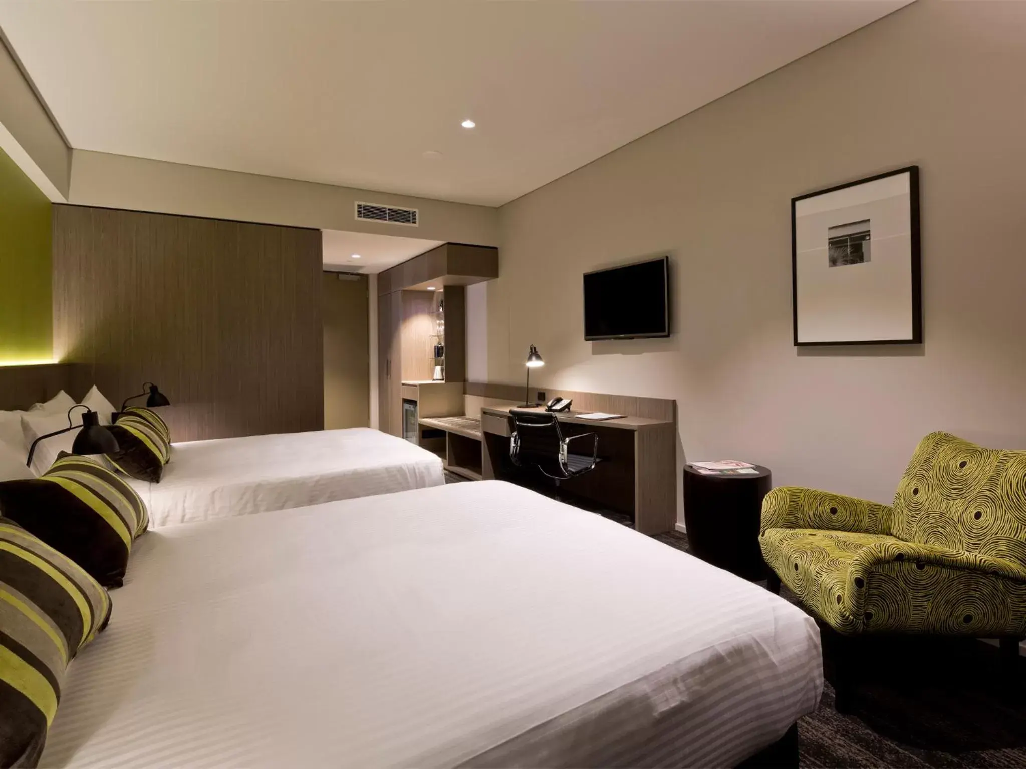 Bed in Glen Hotel and Suites