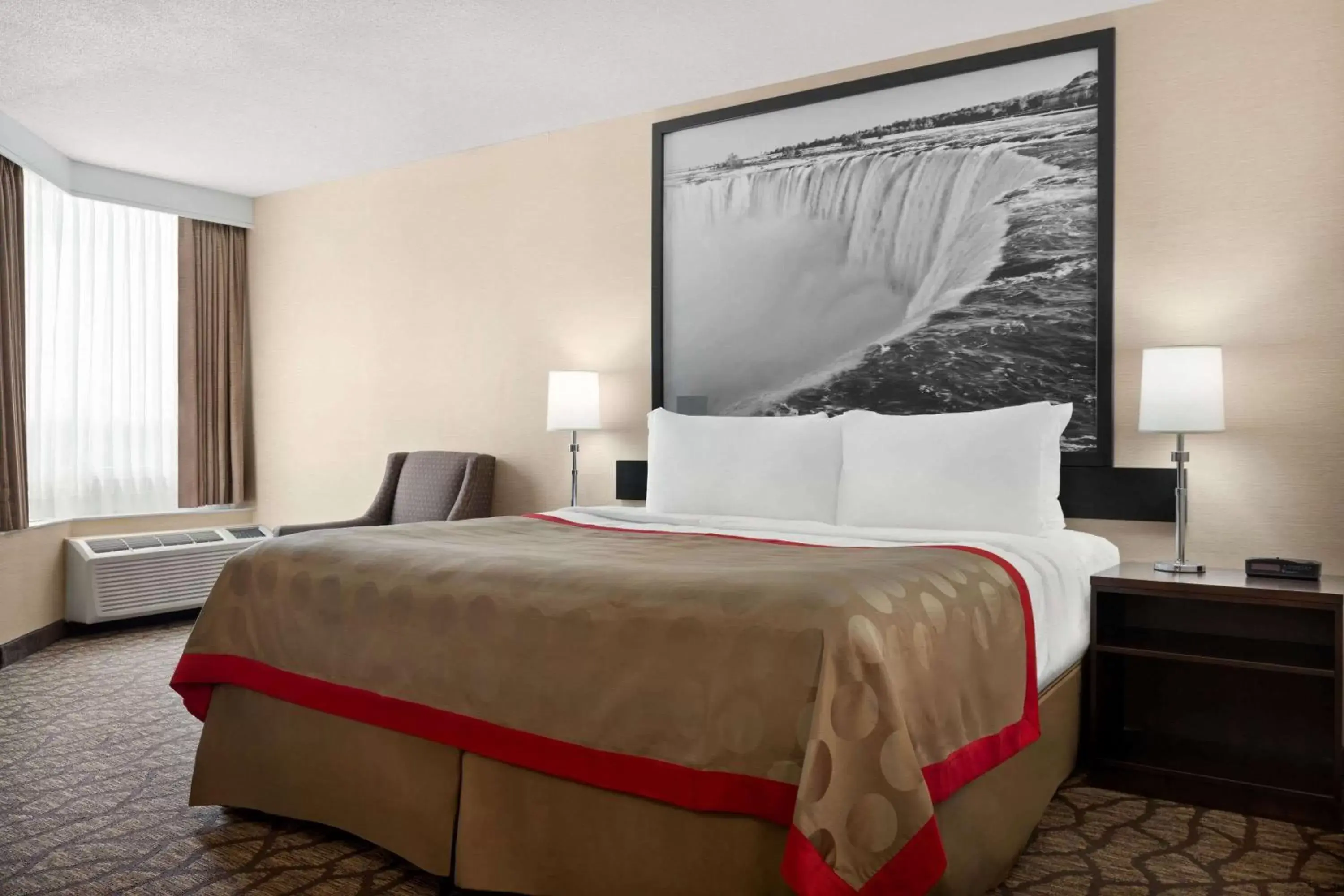 Photo of the whole room, Bed in Ramada By Wyndham Niagara Falls near the Falls