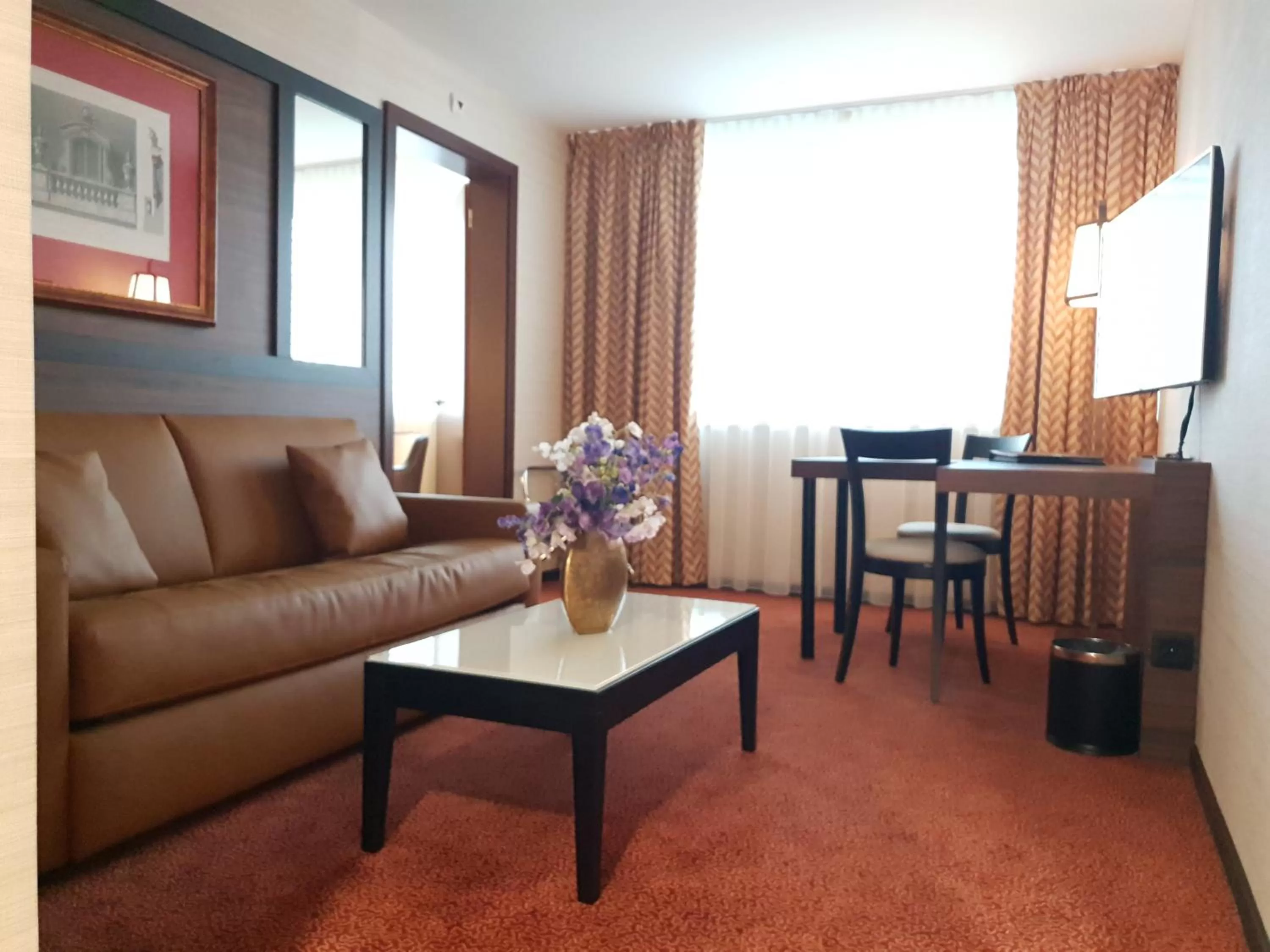 Photo of the whole room in Nash Suites Airport Hotel