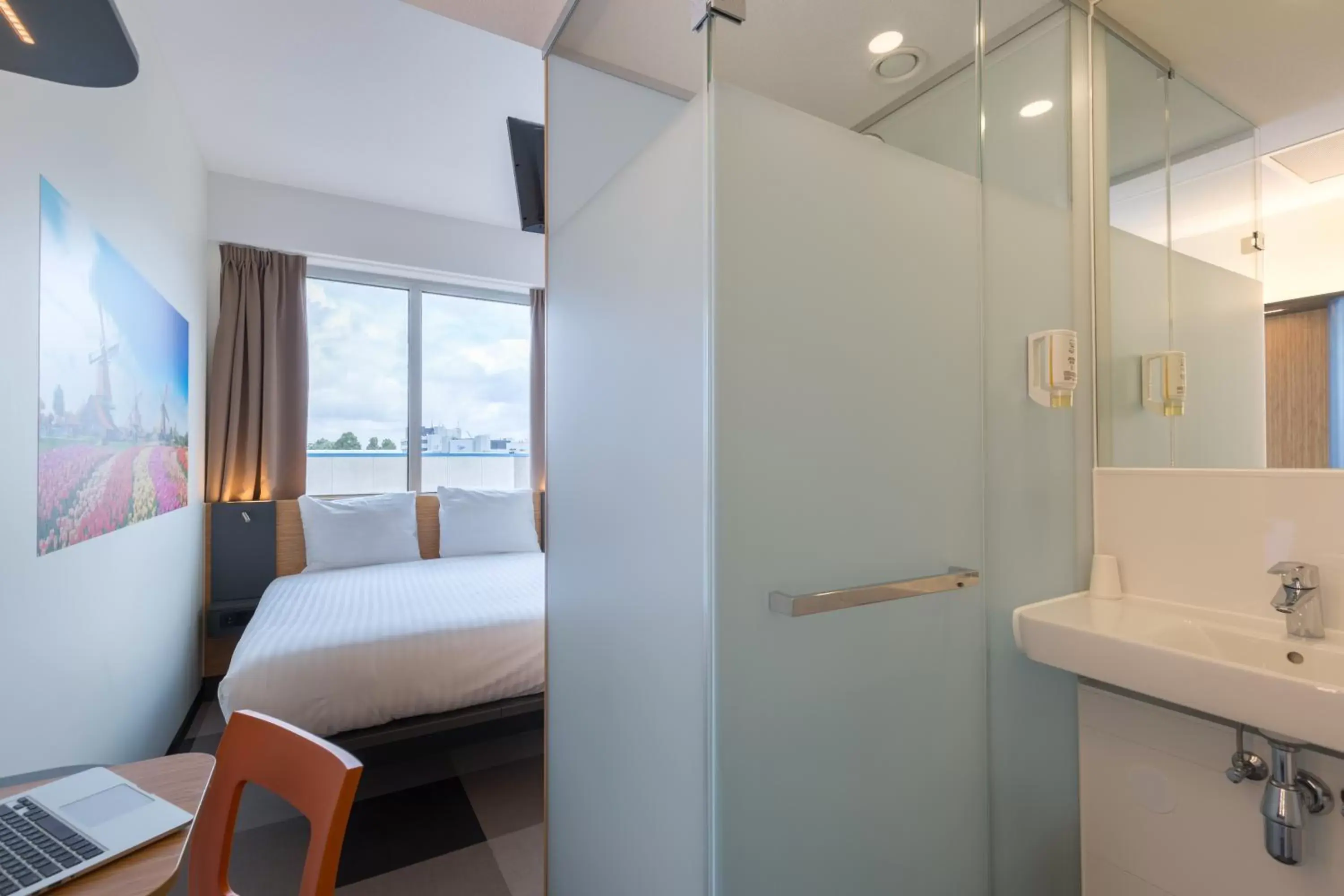 Photo of the whole room, Bathroom in Maxhotel Amsterdam Airport Schiphol
