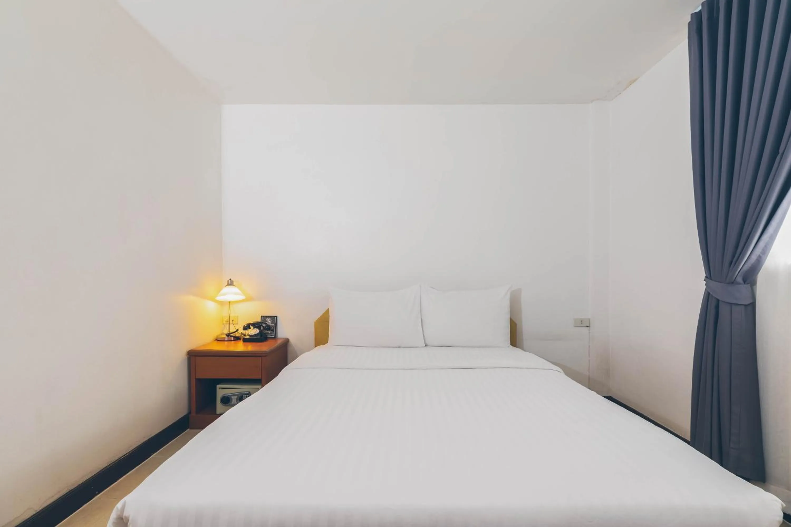 Bed in Atlas Bangkok Hotel