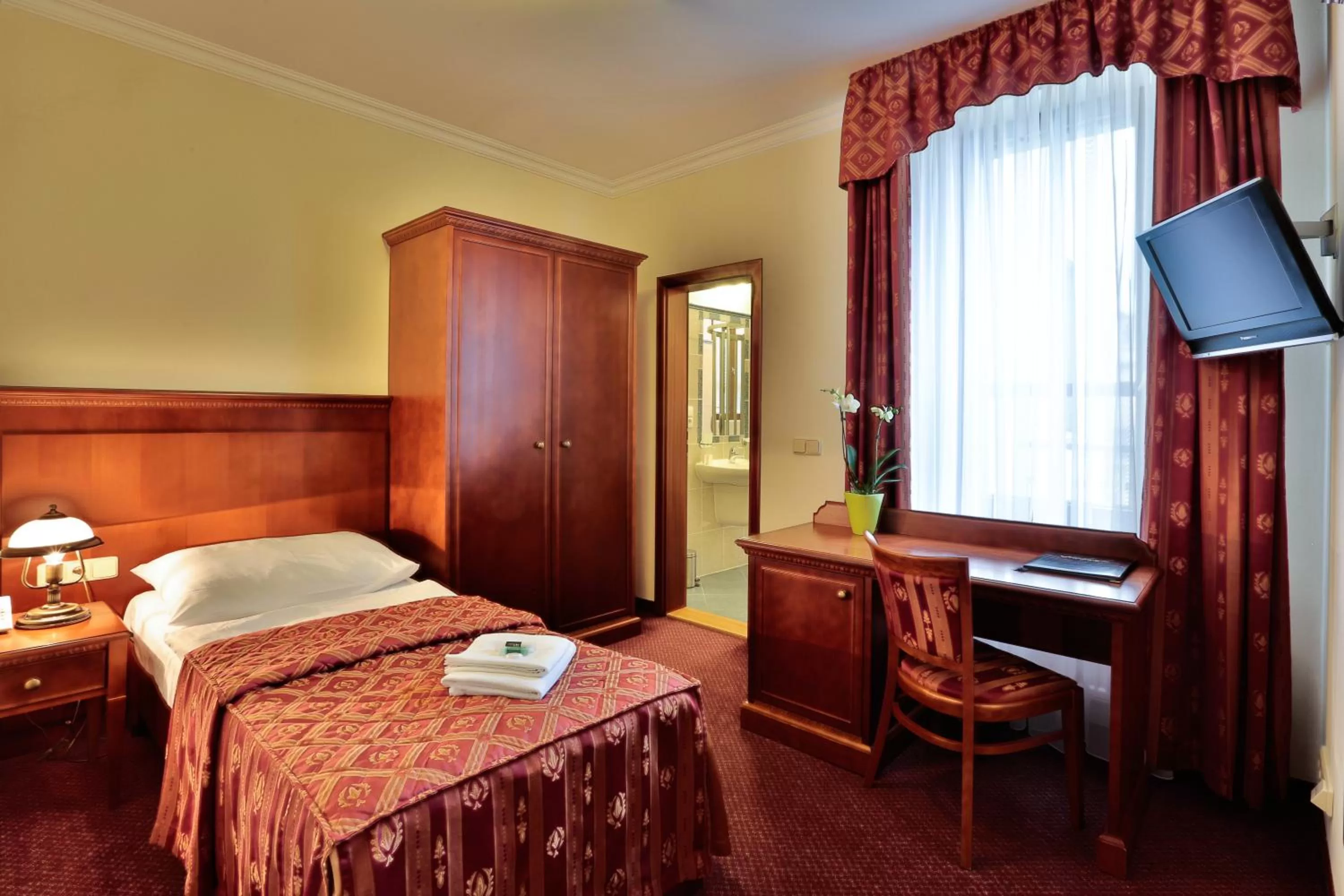 Bed in Arkada Hotel Praha