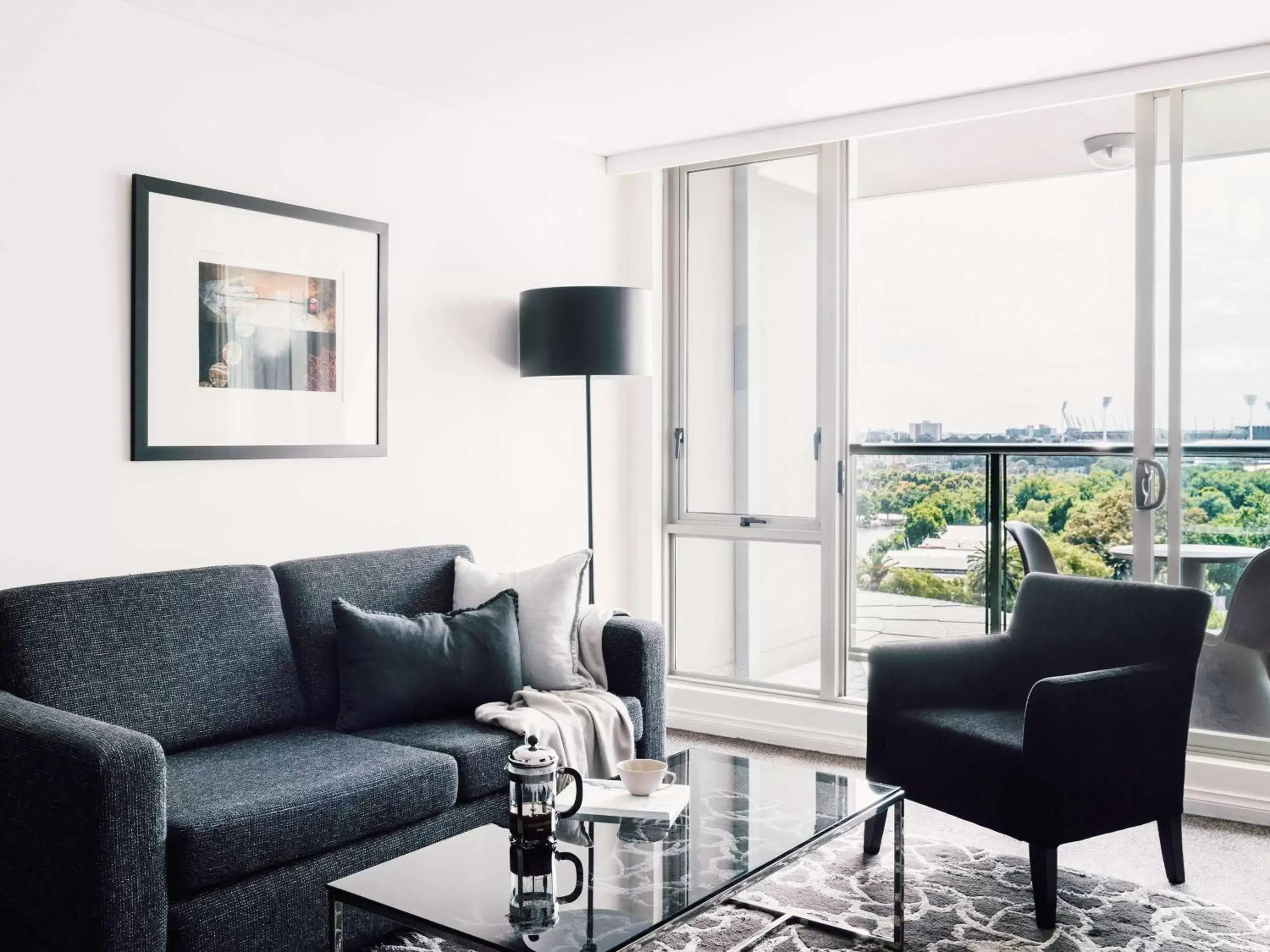 Photo of the whole room, Seating Area in Quay West Suites Melbourne