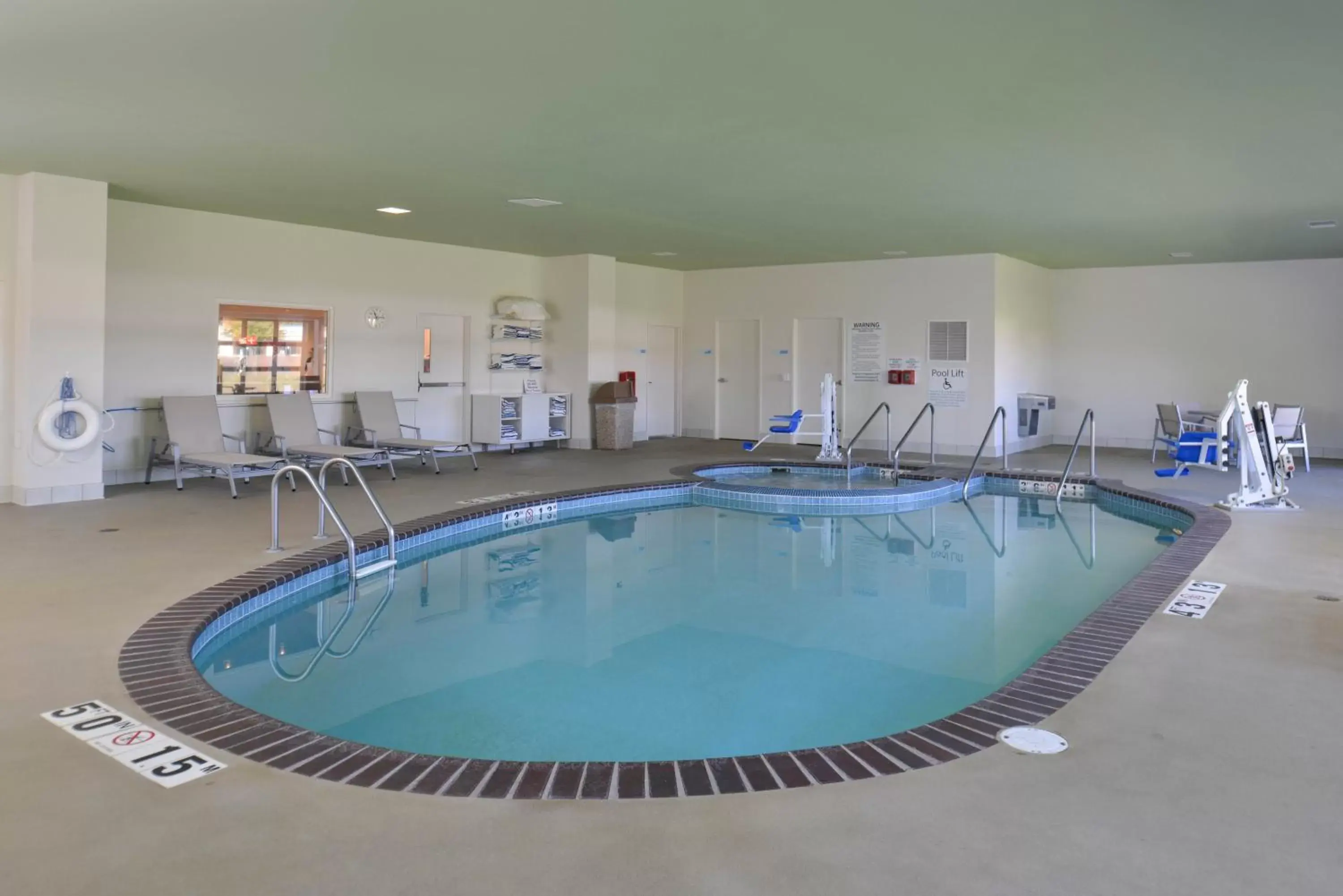 Swimming Pool in Holiday Inn Express Hotel and Suites Stevens Point, an IHG Hotel