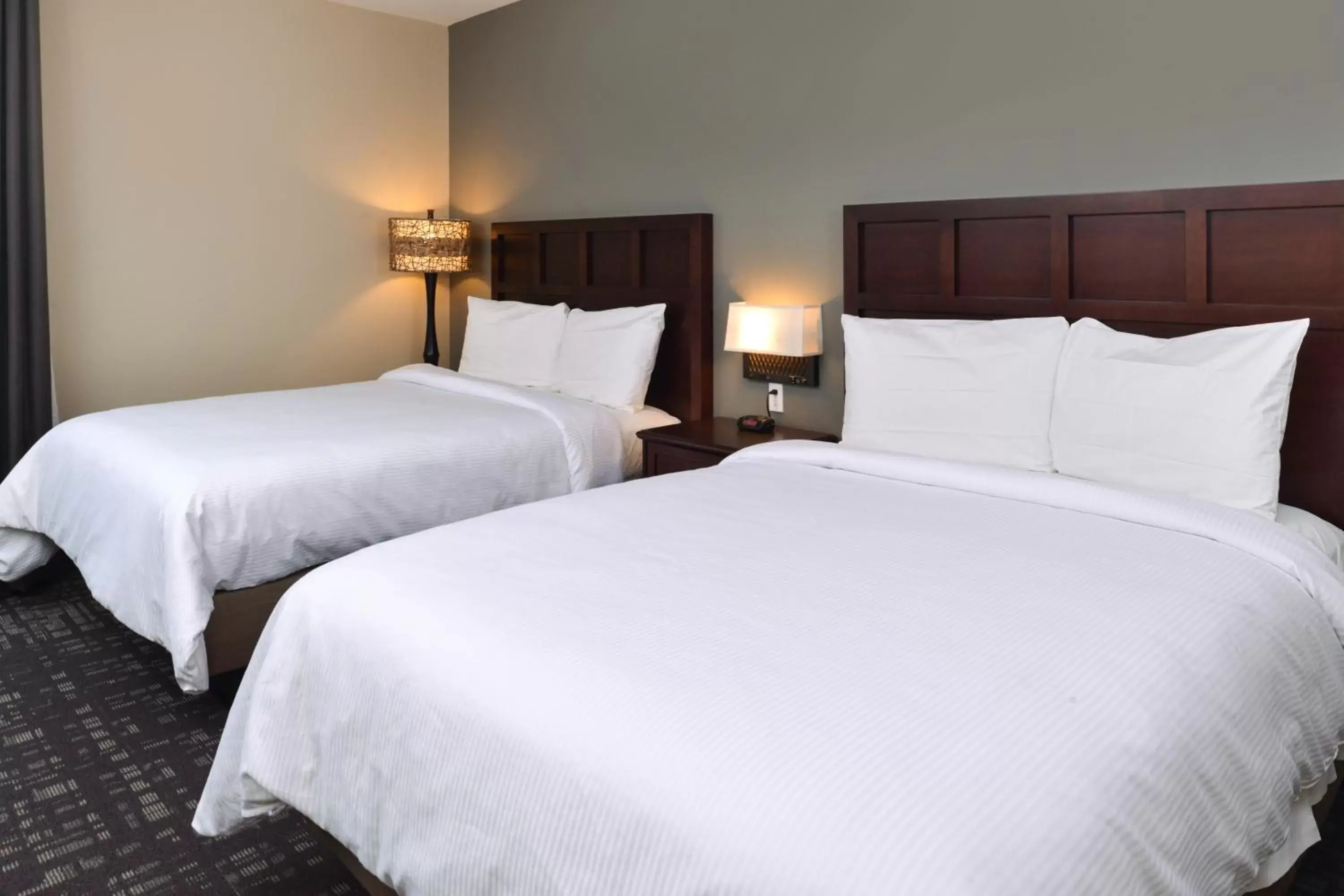 Bedroom, Bed in Legacy Suites Donaldsonville