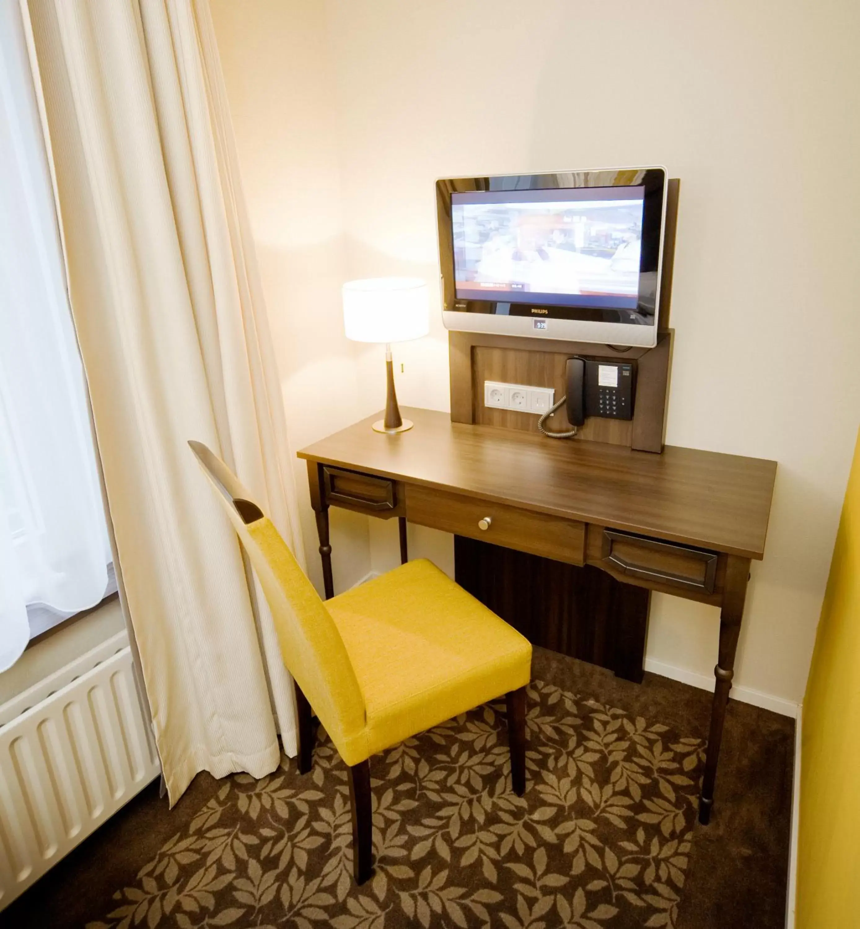 Seating area, TV/Entertainment Center in Hotel Van Walsum