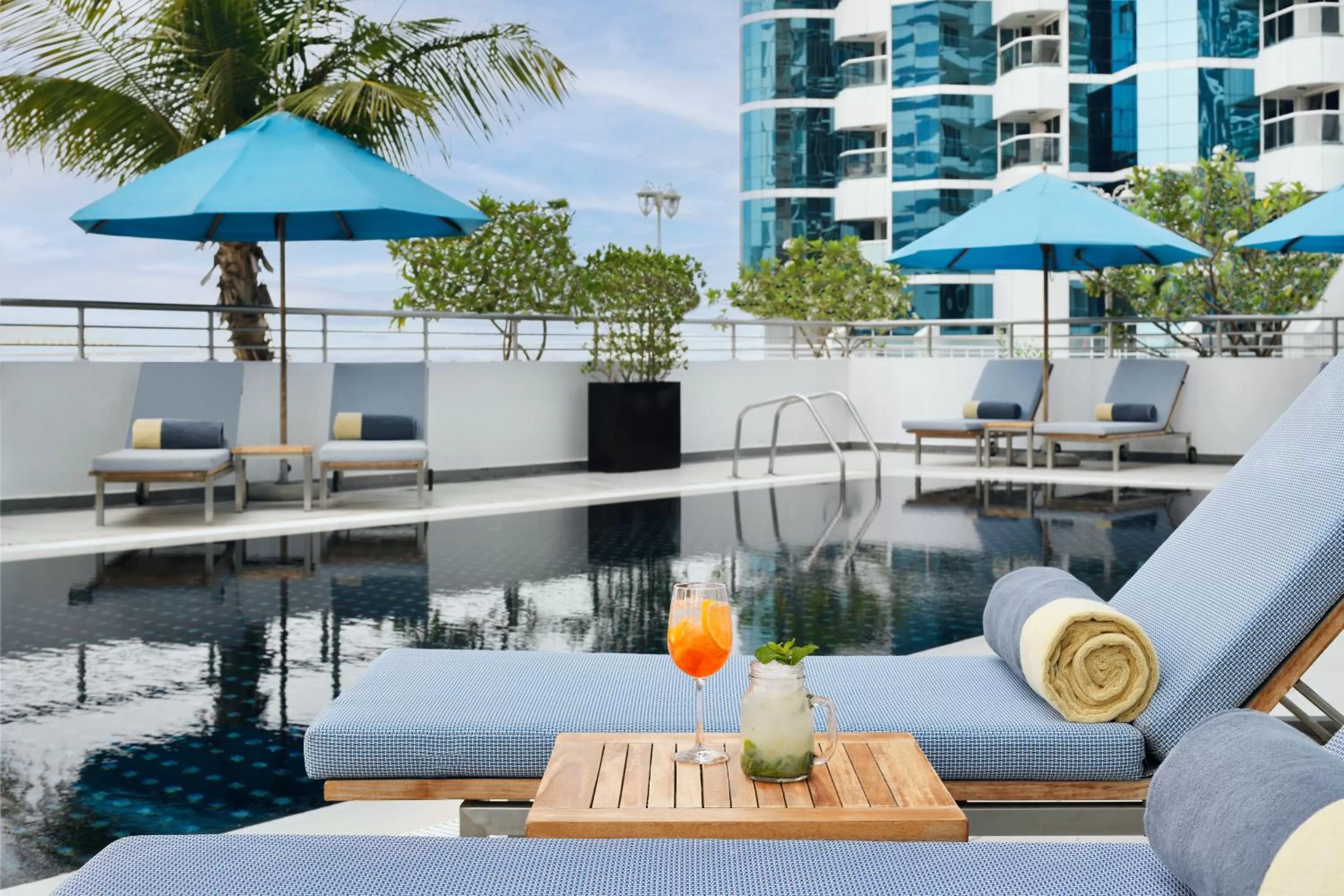 Swimming pool in Mövenpick Hotel Jumeirah Lakes Towers Dubai