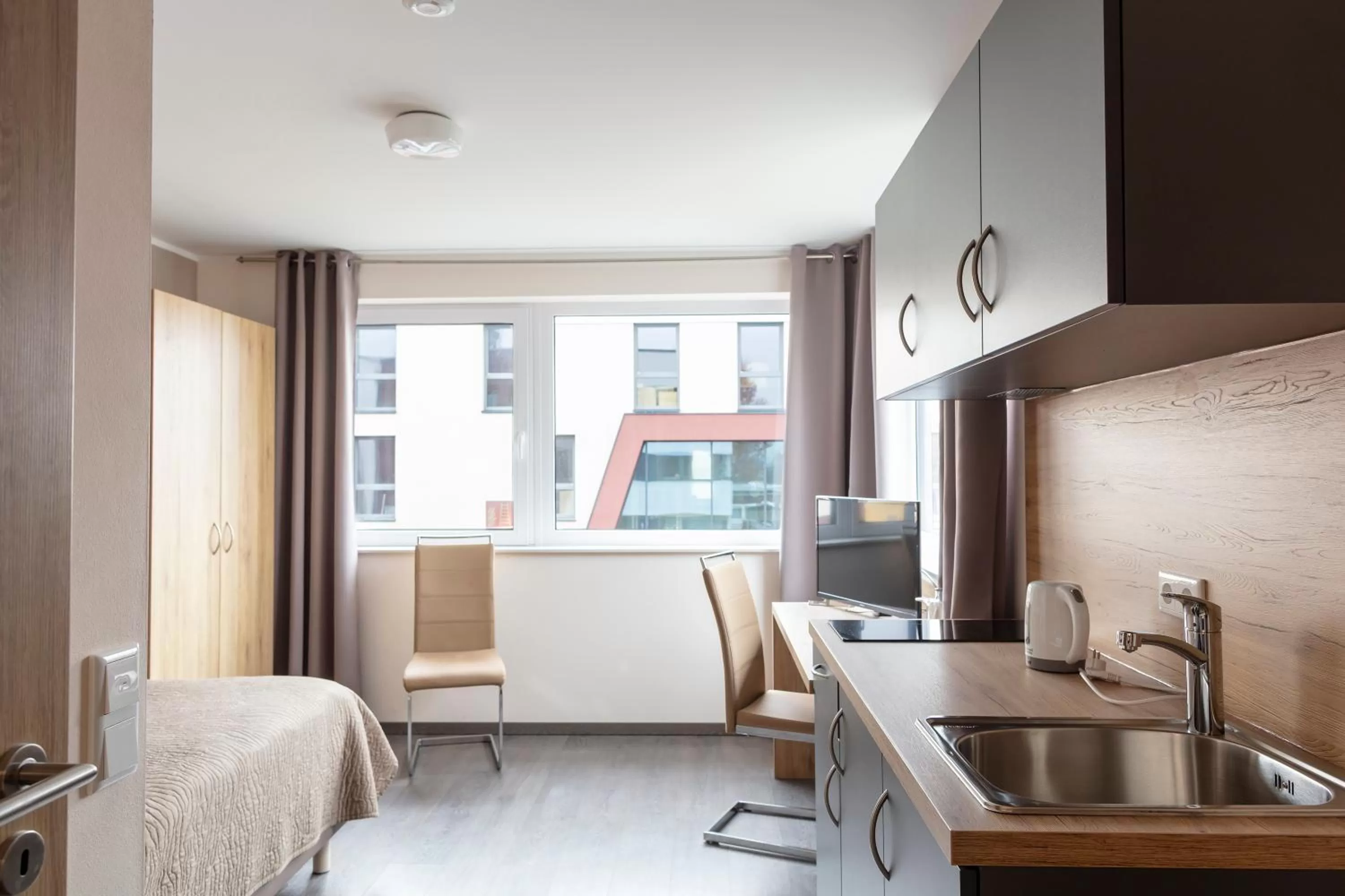 Kitchen or kitchenette in Dominik Hotel & Eventsaal