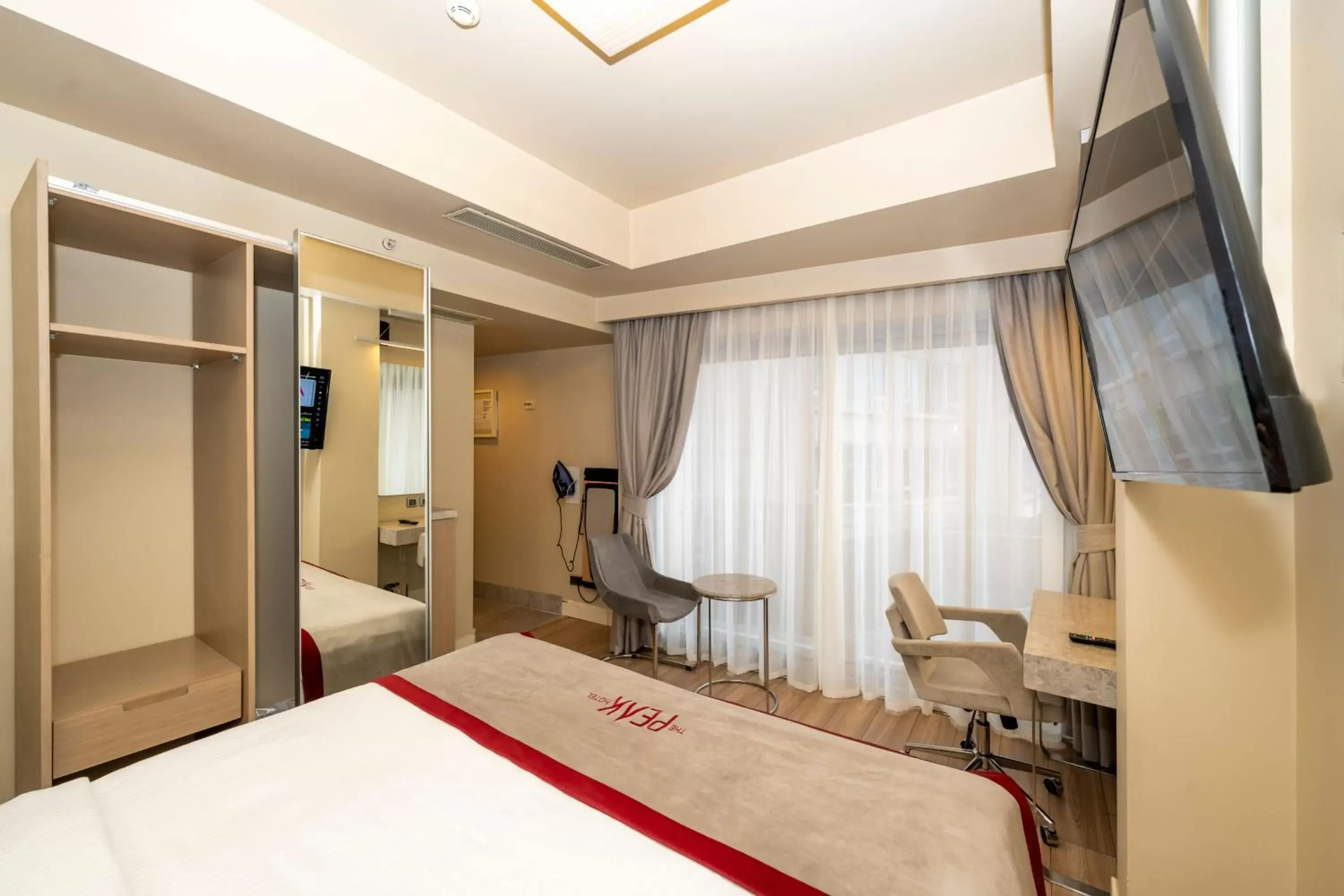 Deluxe Double Room with Balcony in Ramada By Wyndham Istanbul Pera Taksim Deluxe Double Room with Balcony in Ramada By Wyndham Istanbul Pera Taksim