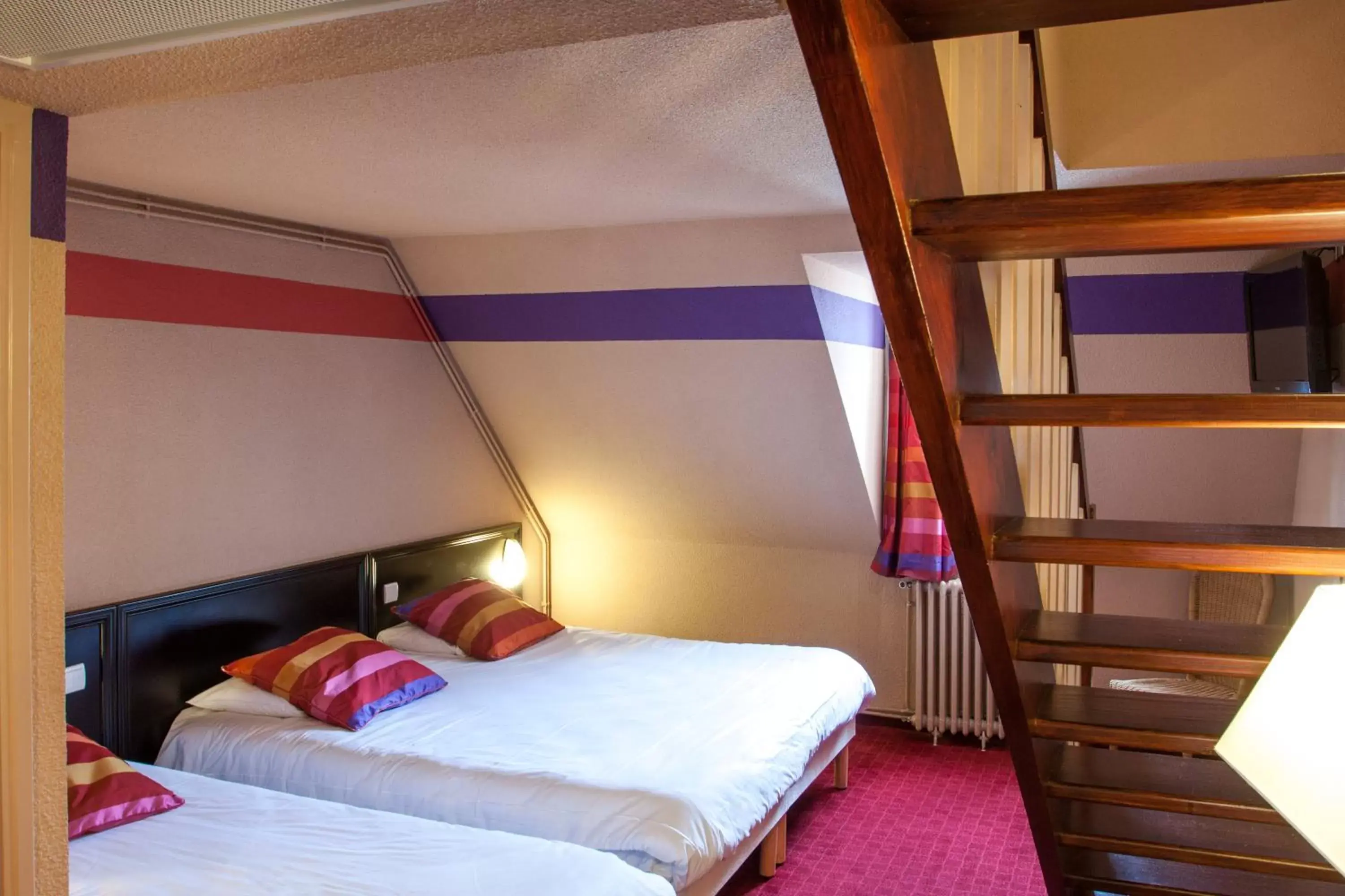 Quadruple Room in Hôtel Saint Sauveur