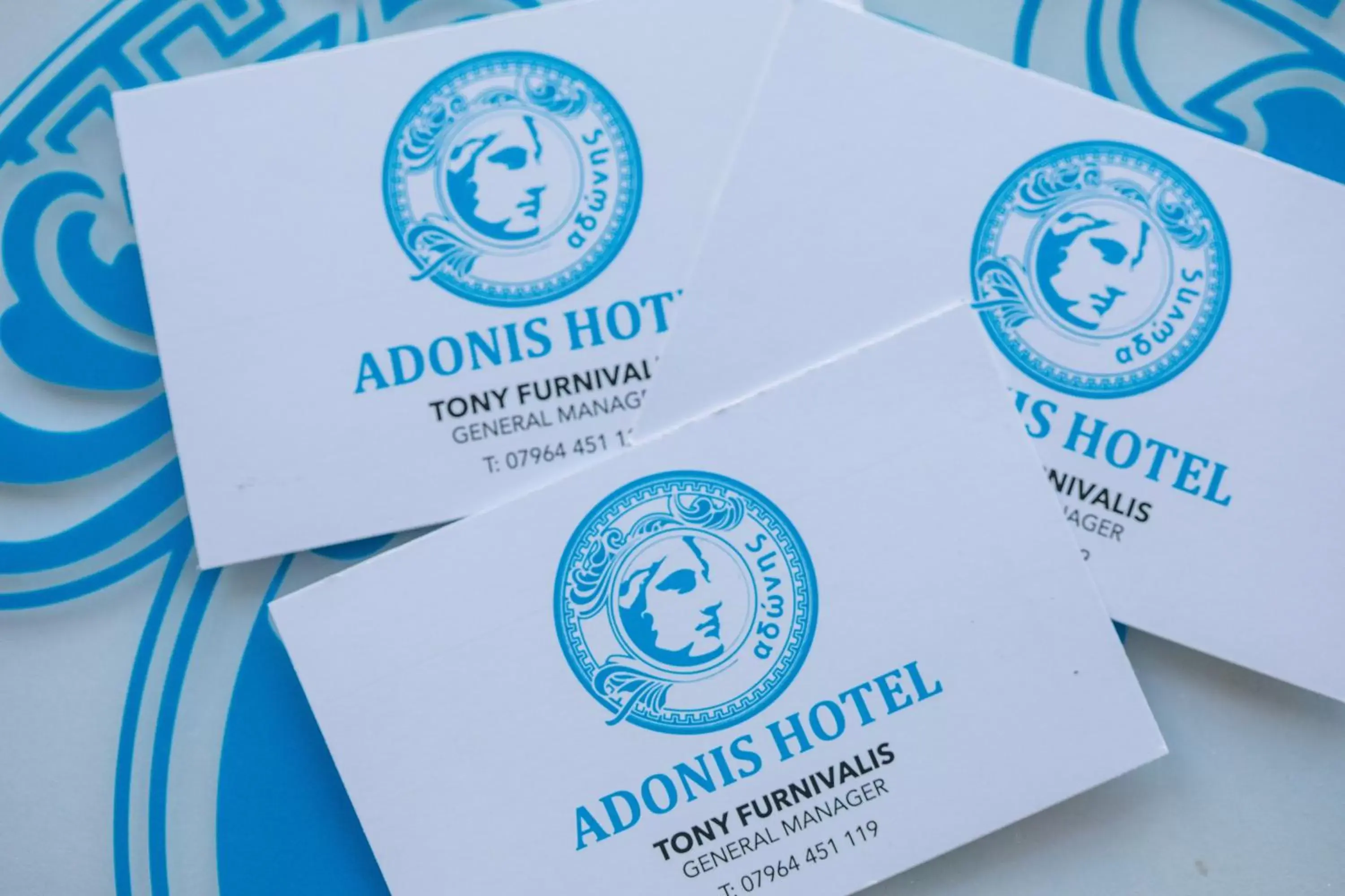 Property logo or sign in The Adonis Hotel