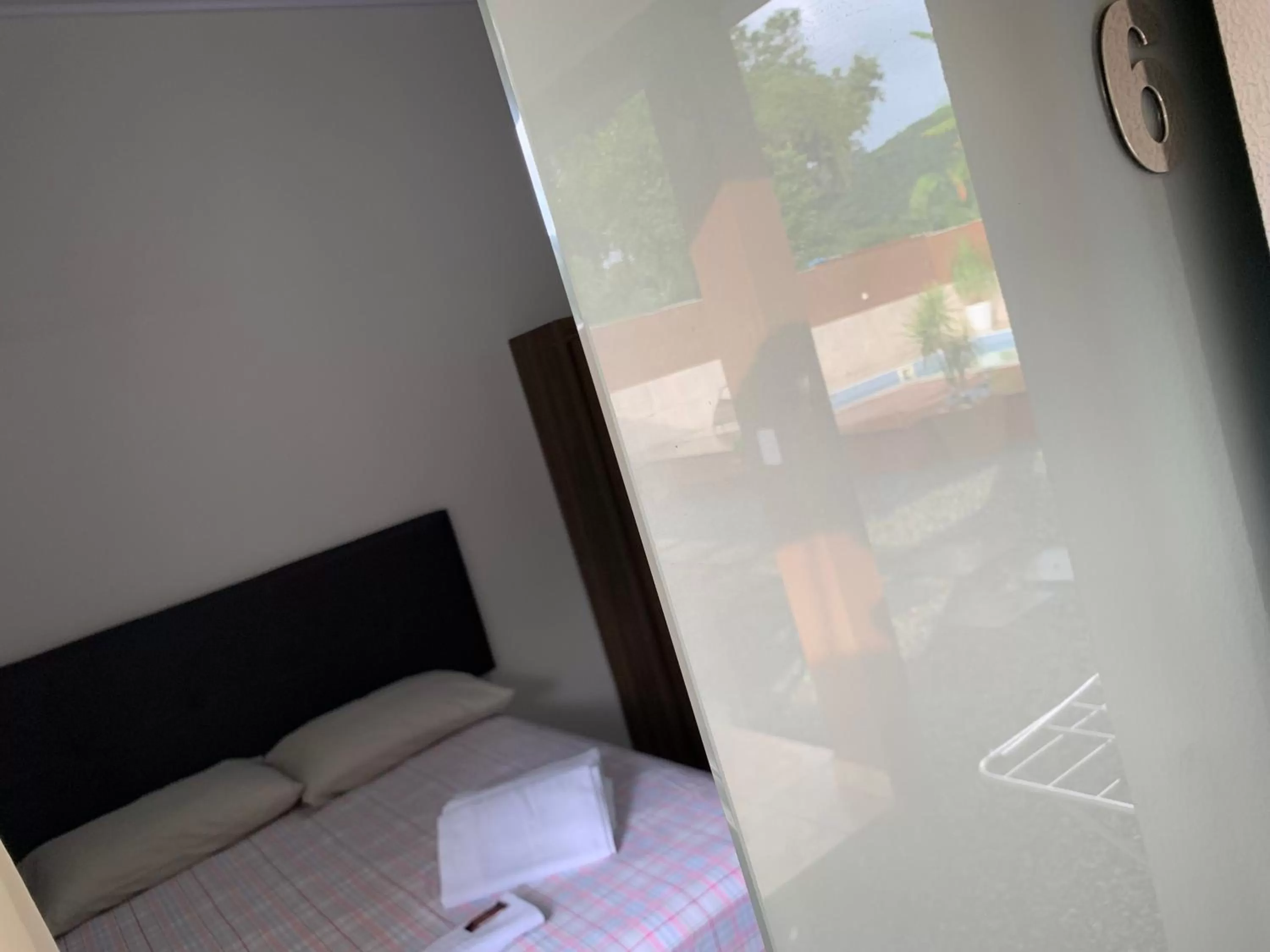 Bed in Pousada Tio Tonho