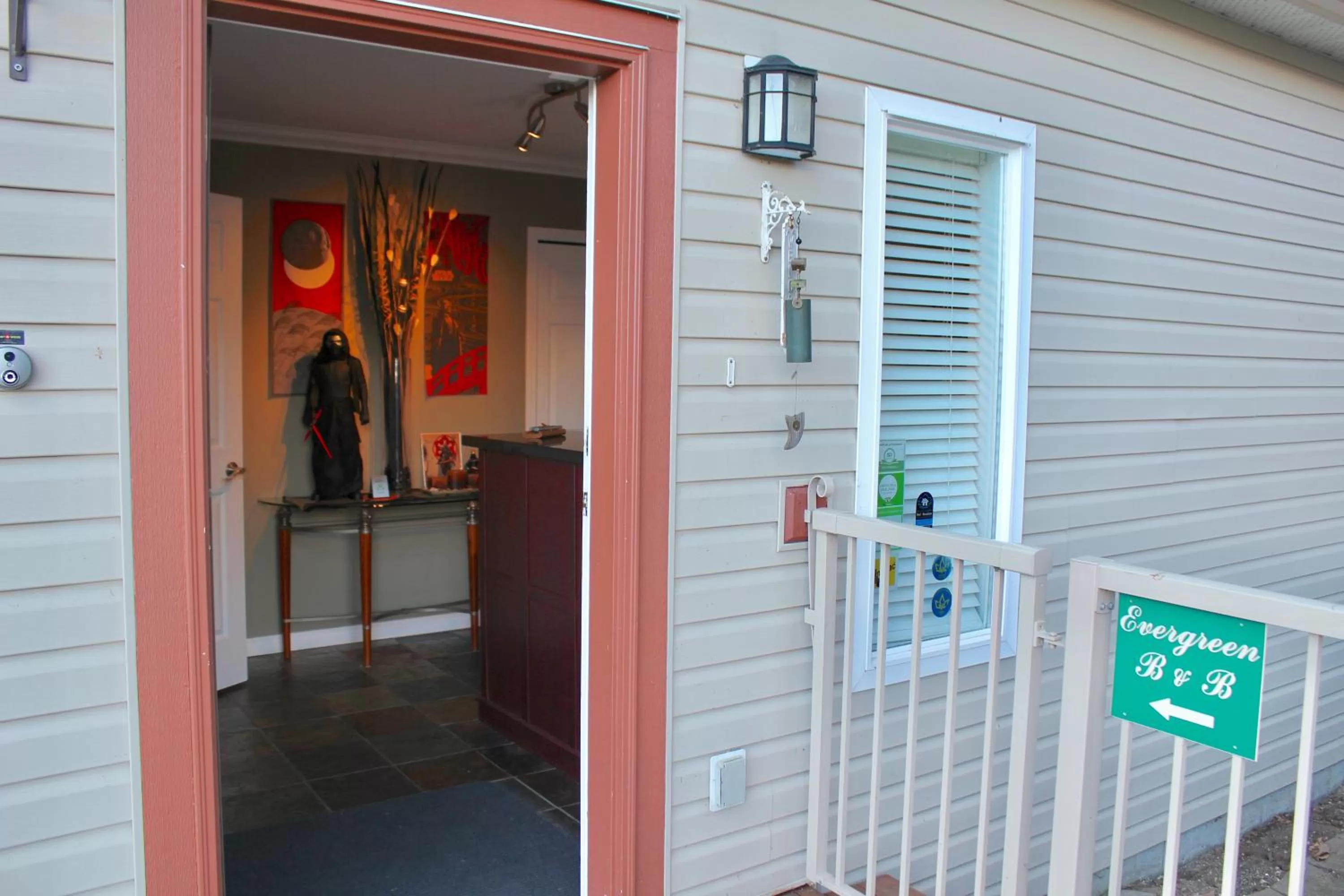 Property logo or sign in Evergreen Bed & Breakfast