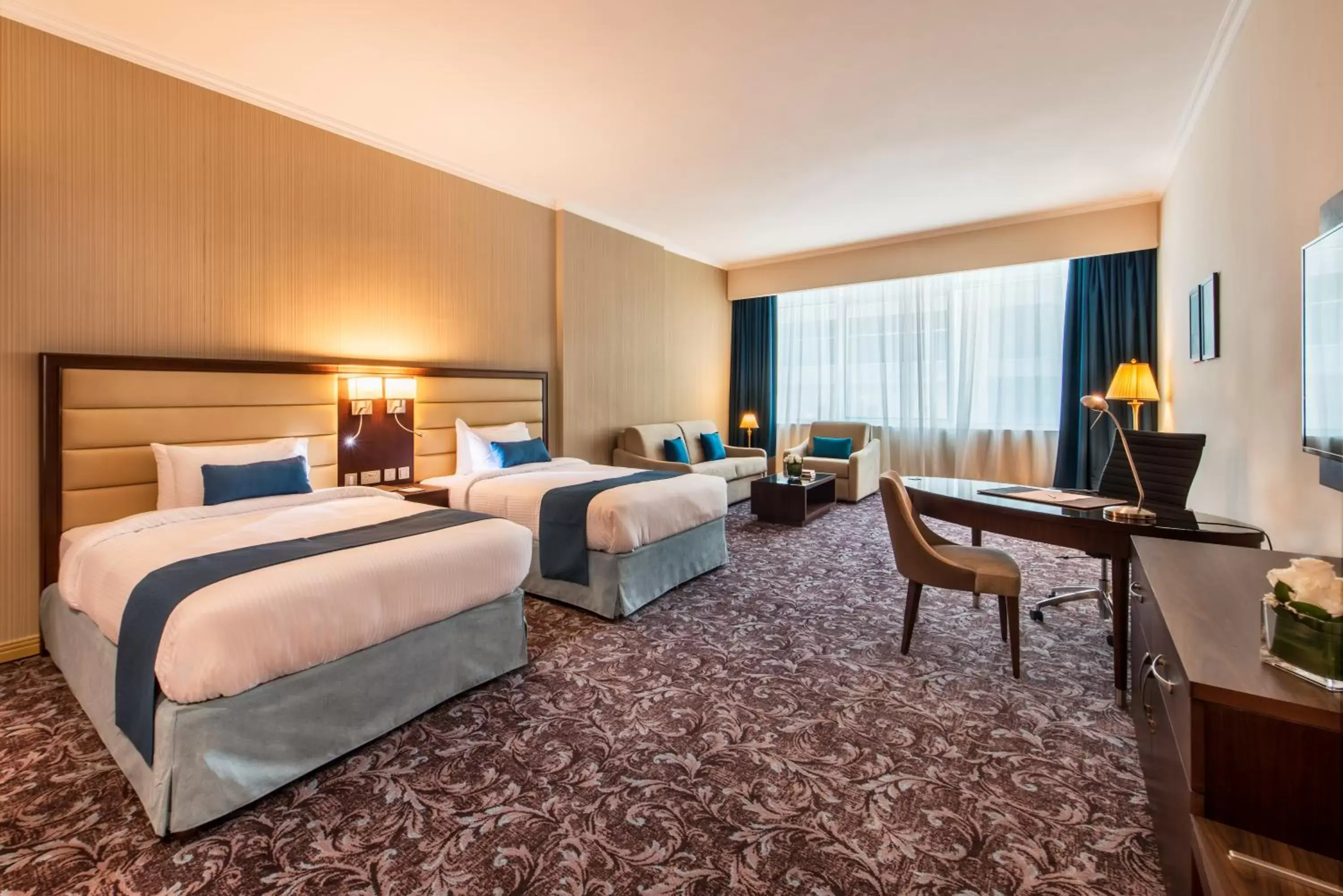 Bedroom in Golden Tulip Doha Hotel