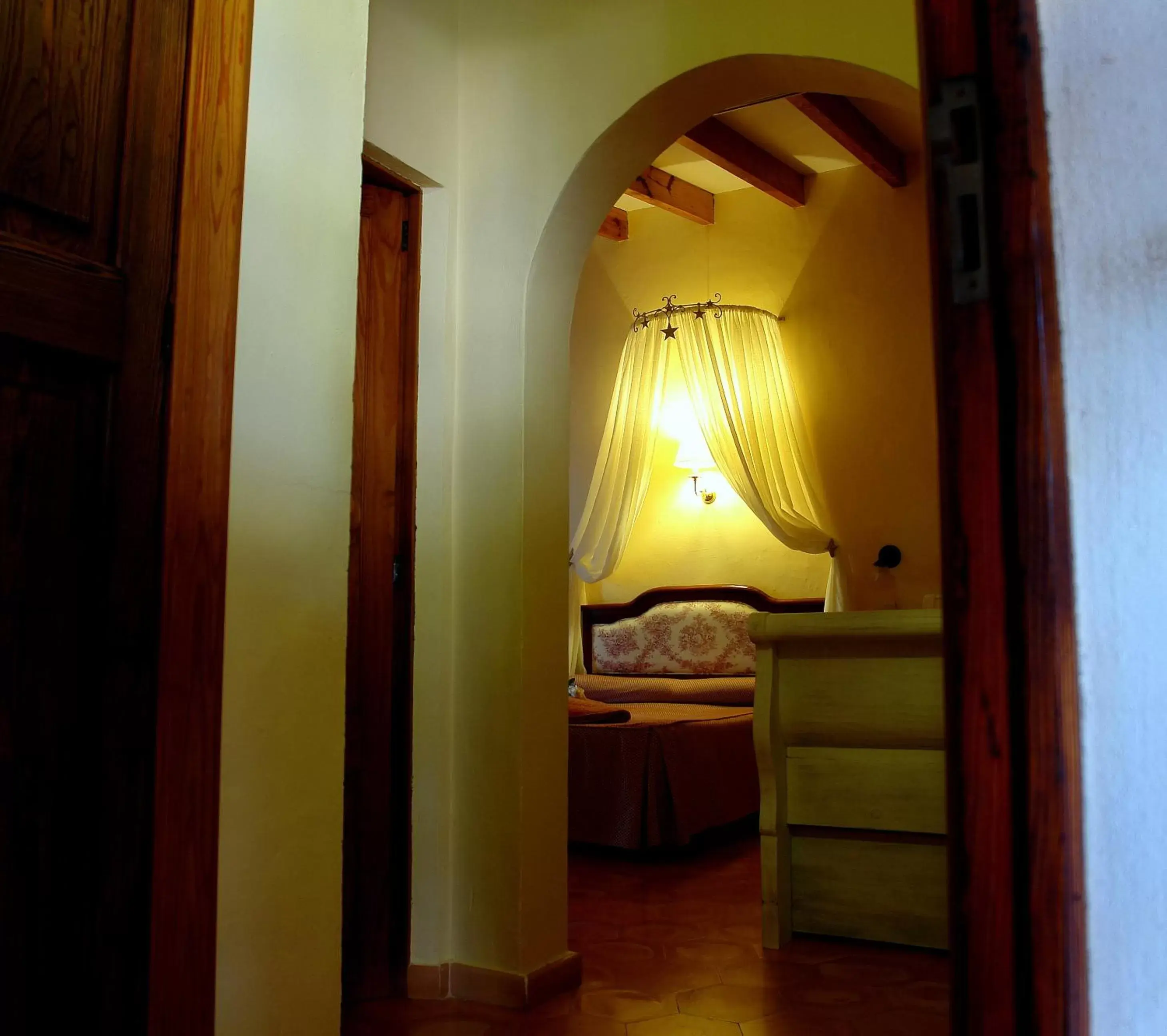 Photo of the whole room, Bed in Aumallia Hotel & Spa