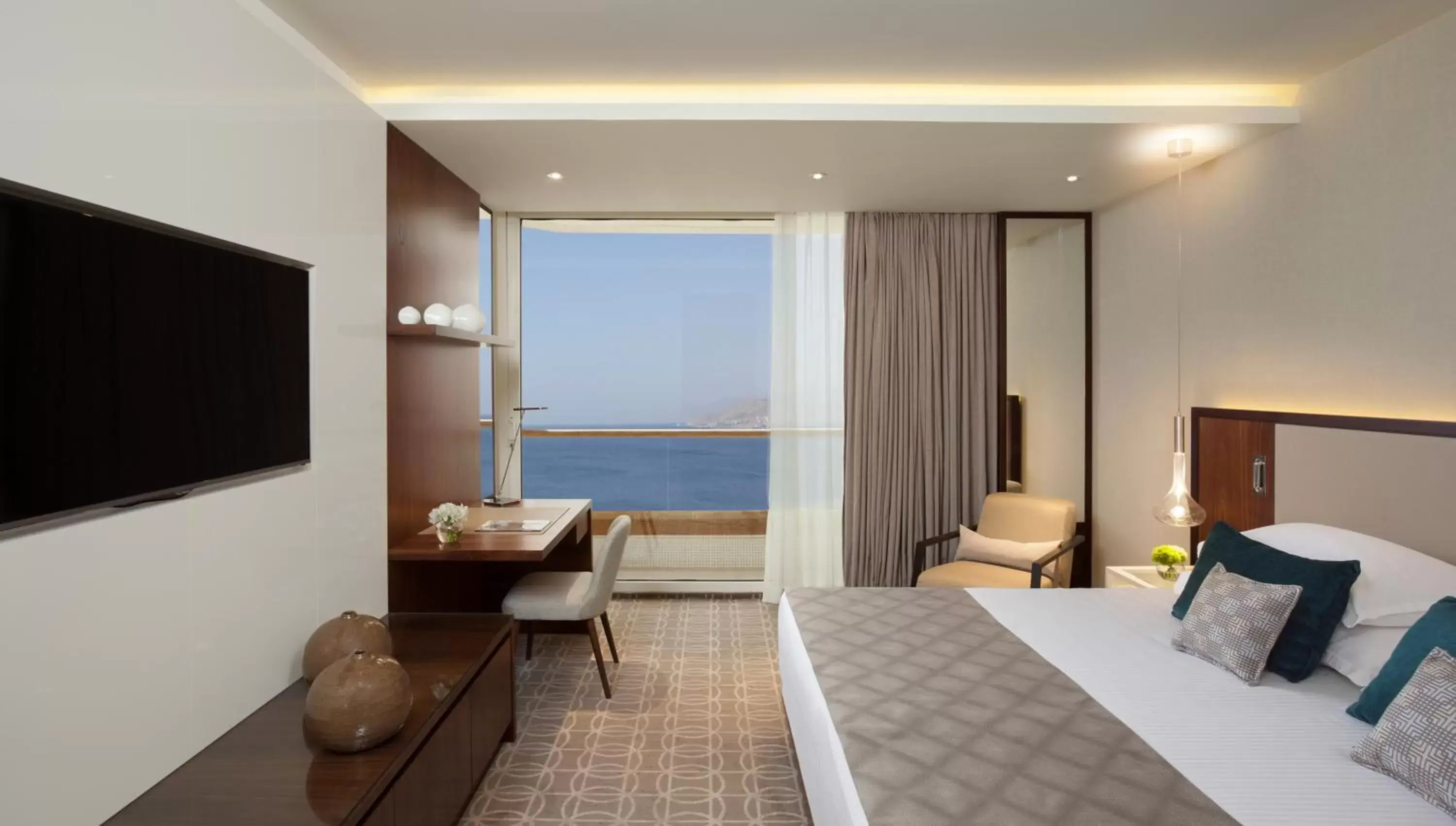 Photo of the whole room, TV/Entertainment Center in Royal Beach Eilat by Isrotel Exclusive