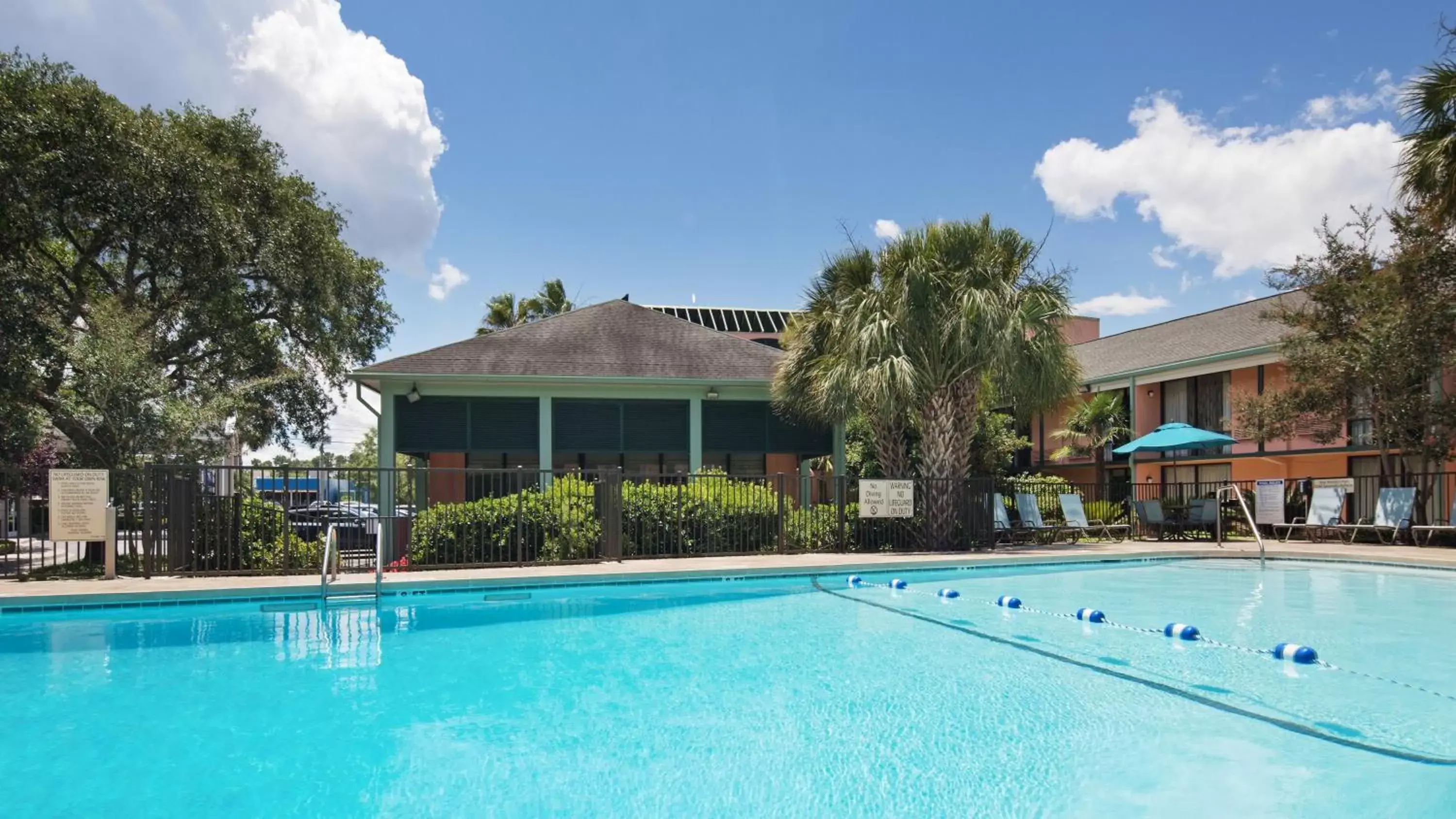 Swimming pool, Property Building in Best Western Charleston Inn