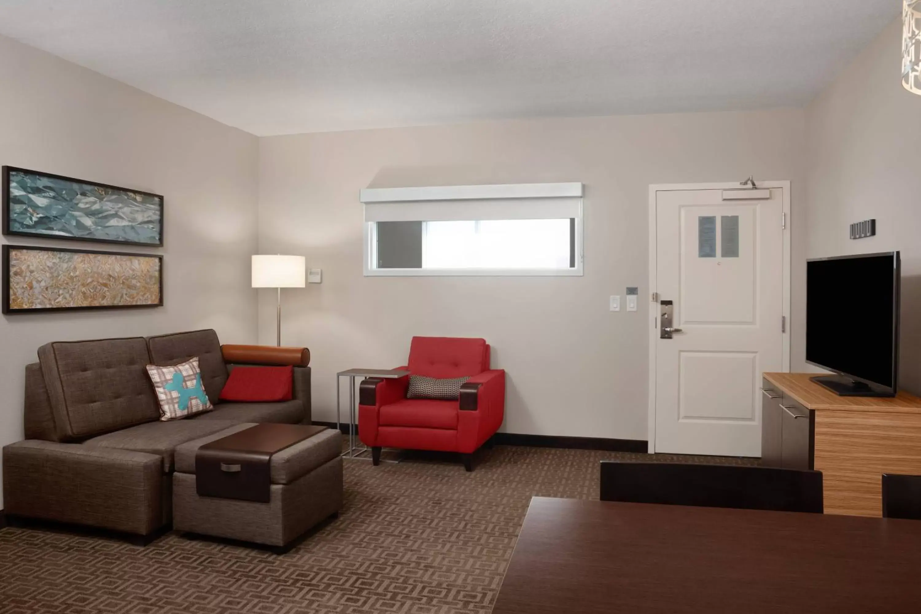 Living room, Seating Area in TownePlace Suites by Marriott Orlando Theme Parks/Lake Buena Vista