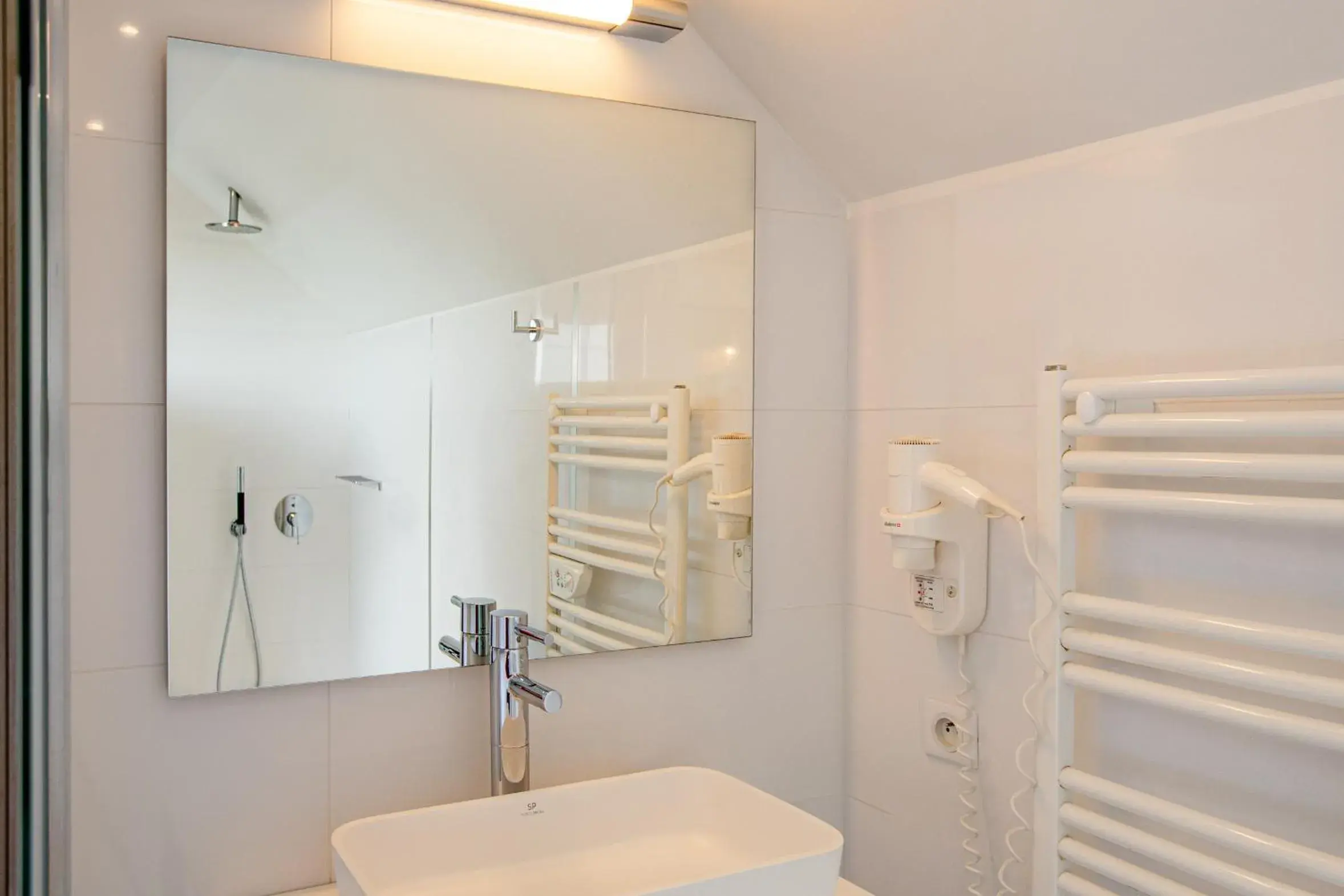 Bathroom in Hôtel de La Plage by Inwood Hotels