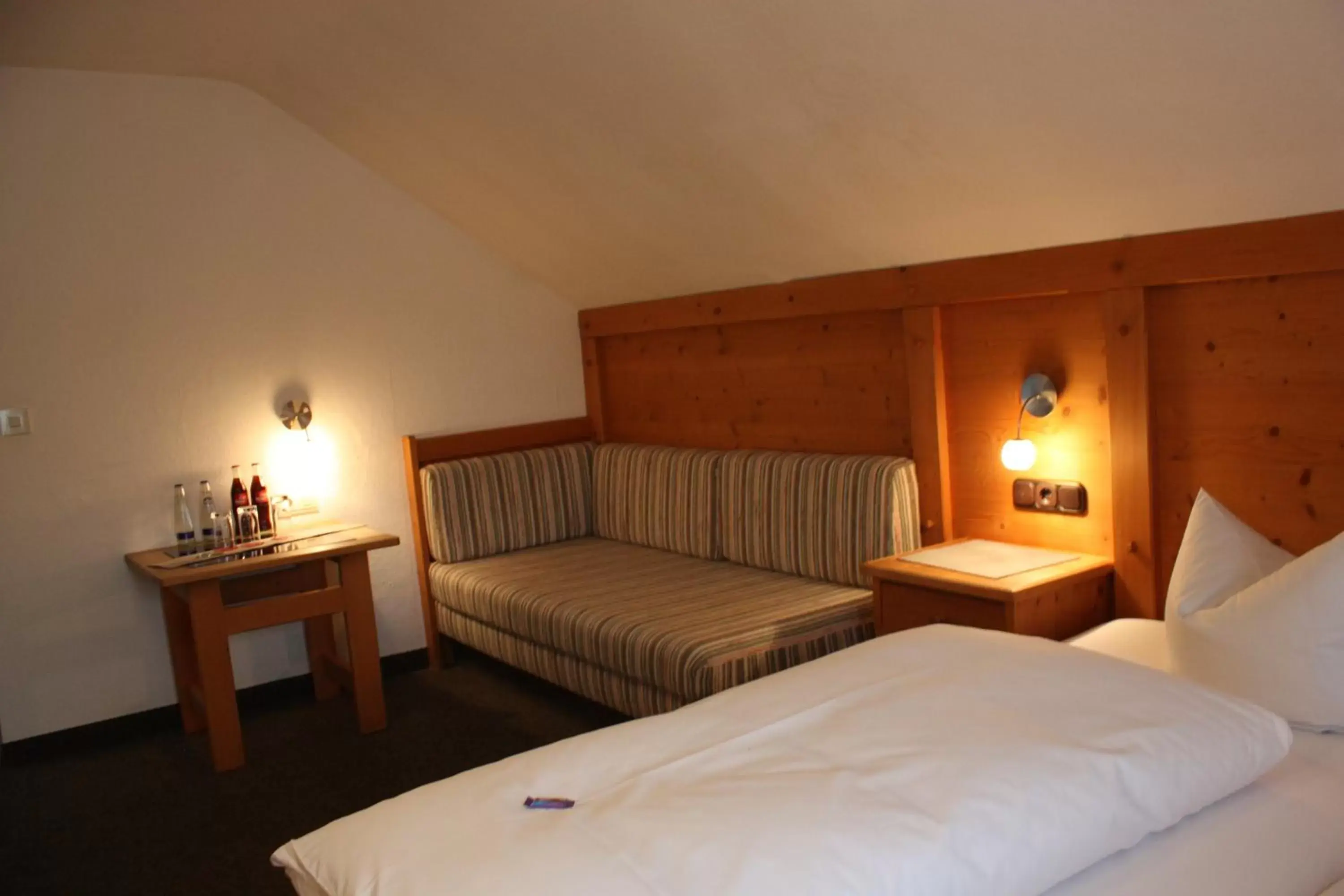 Bed in Das Posch Hotel