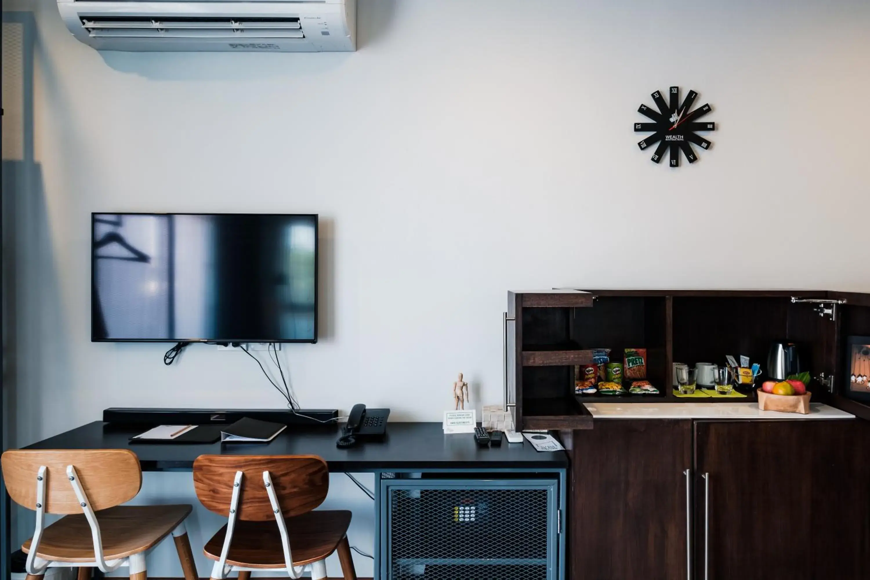 Photo of the whole room, TV/Entertainment Center in Wealth Boutique Hotel Chiang Mai