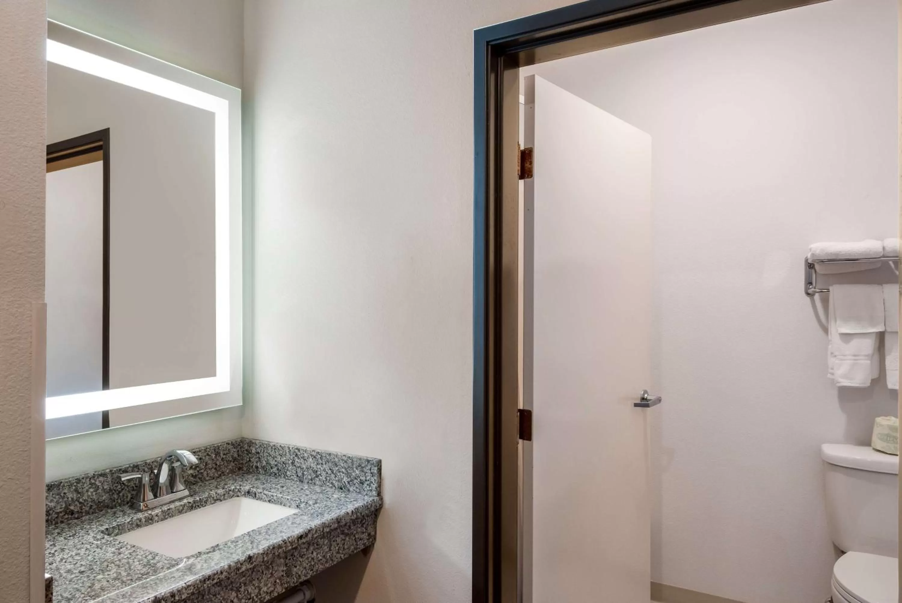 Bathroom in SureStay Plus Hotel by Best Western Coralville Iowa City