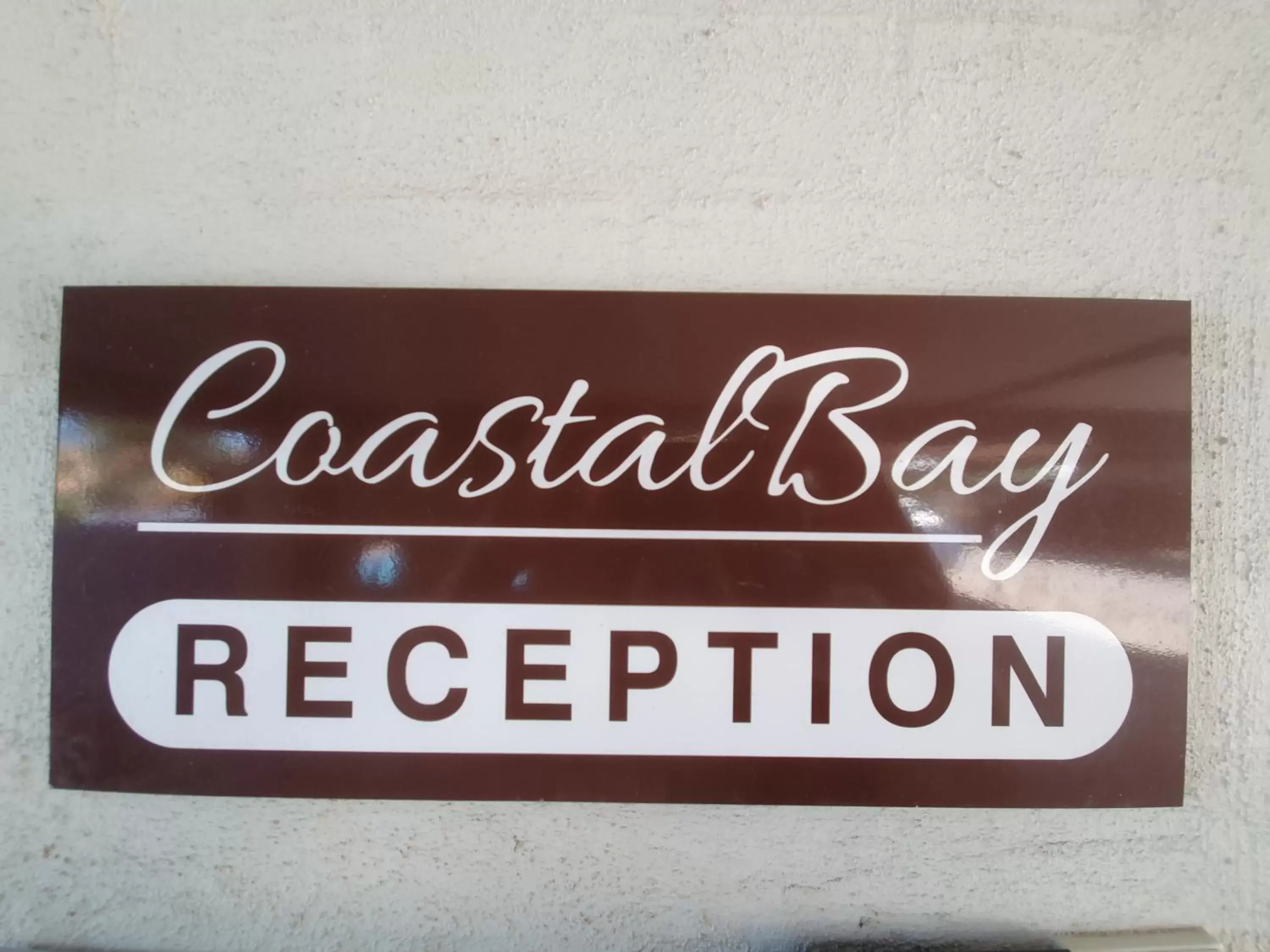 Property logo or sign in Coastal Bay Motel