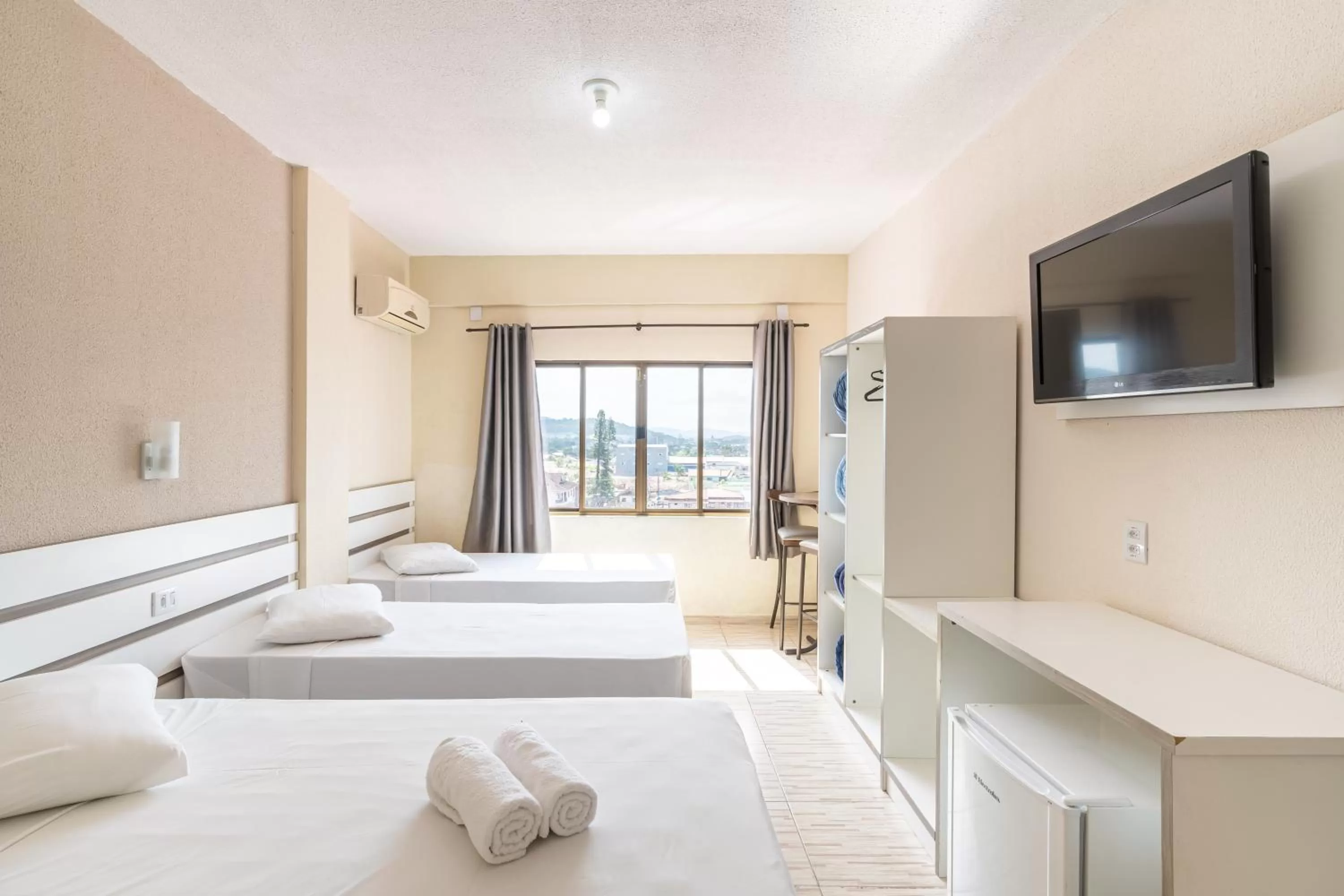 Bed in Hotel Conexão