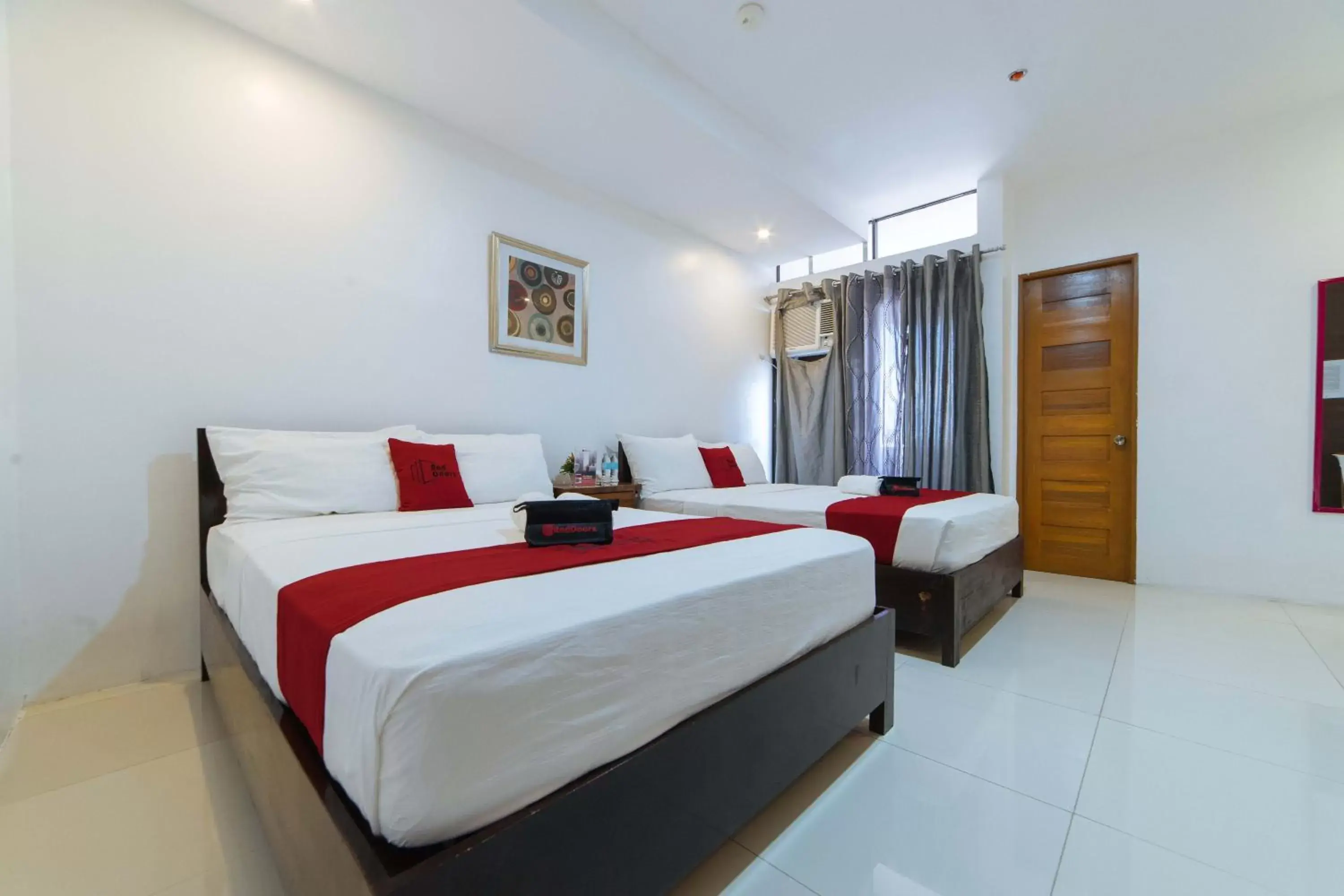 Photo of the whole room, Bed in RedDoorz Plus @ San Roque Roxas City Photo of the whole room, Bed in RedDoorz Plus @ San Roque Roxas City