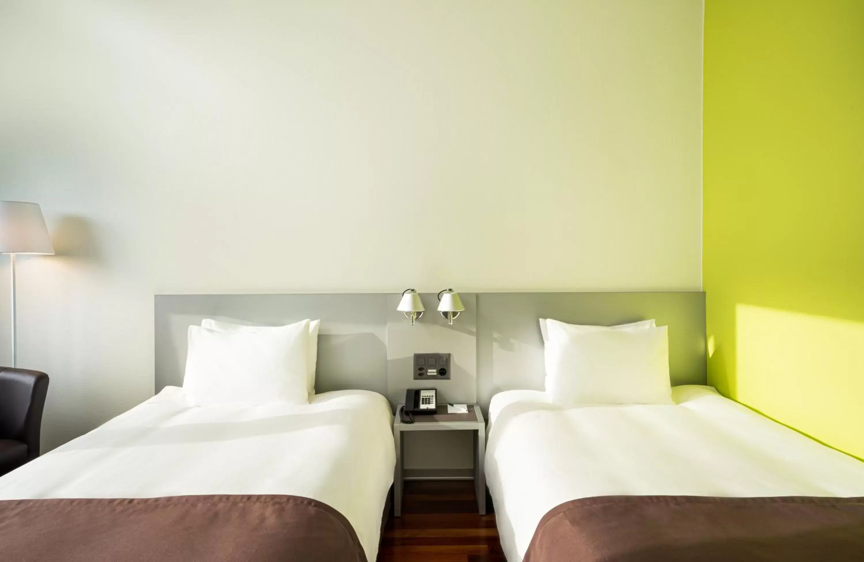Bed in Holiday Inn Bern Westside, an IHG Hotel