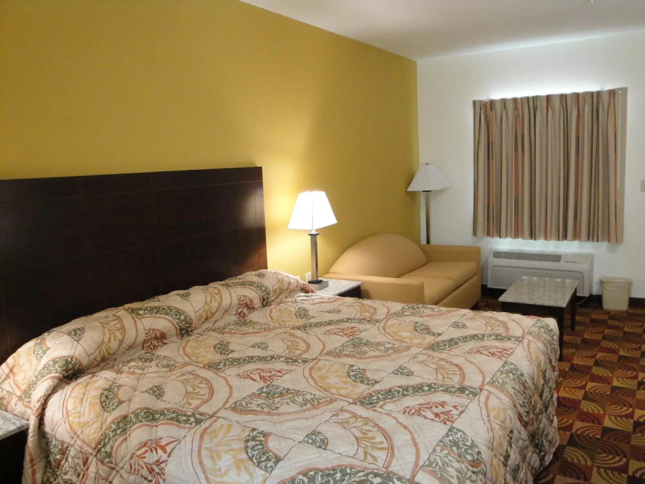 Bed in Sands Inn & Suites