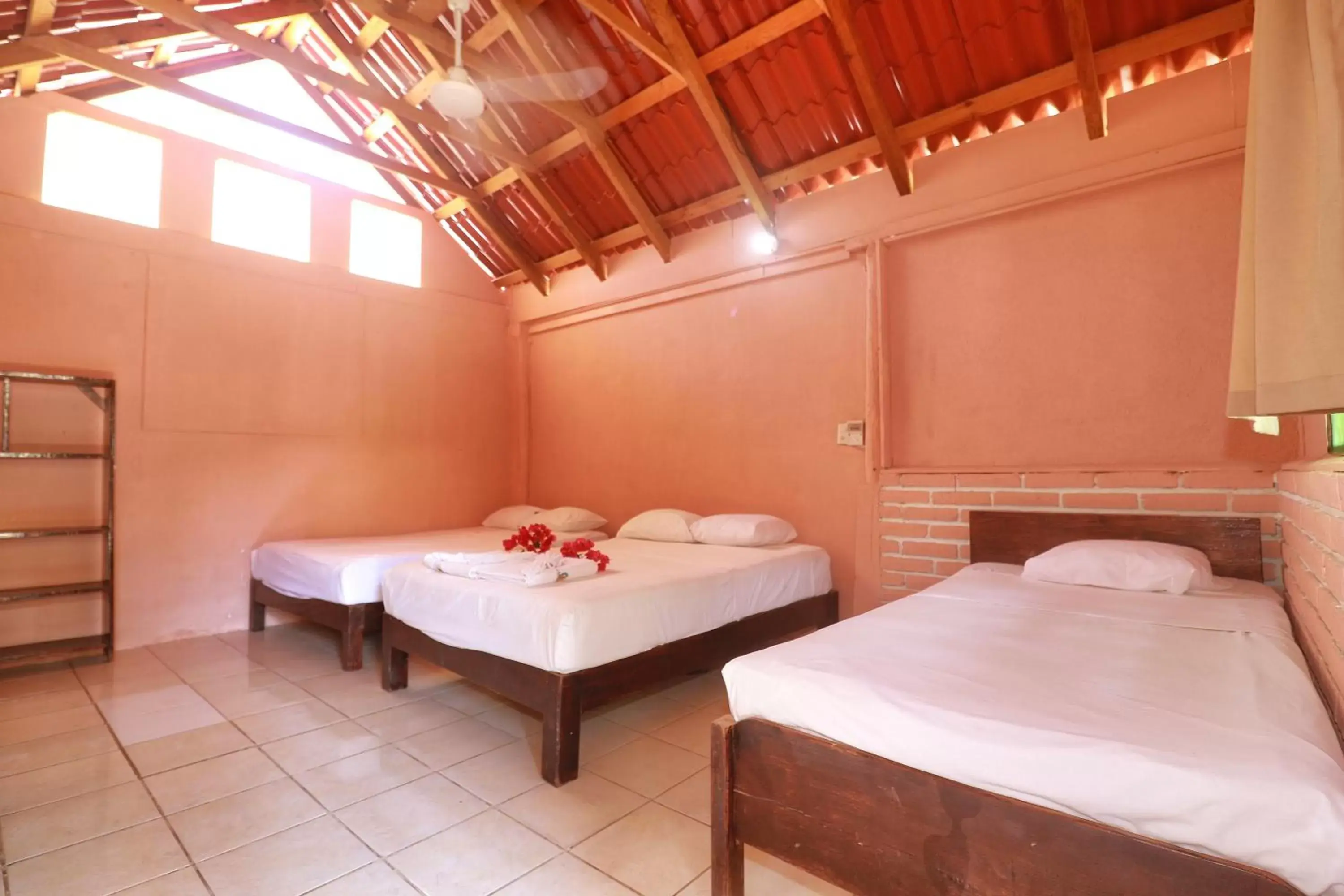 Bed in Hotel Bungalows Acuario