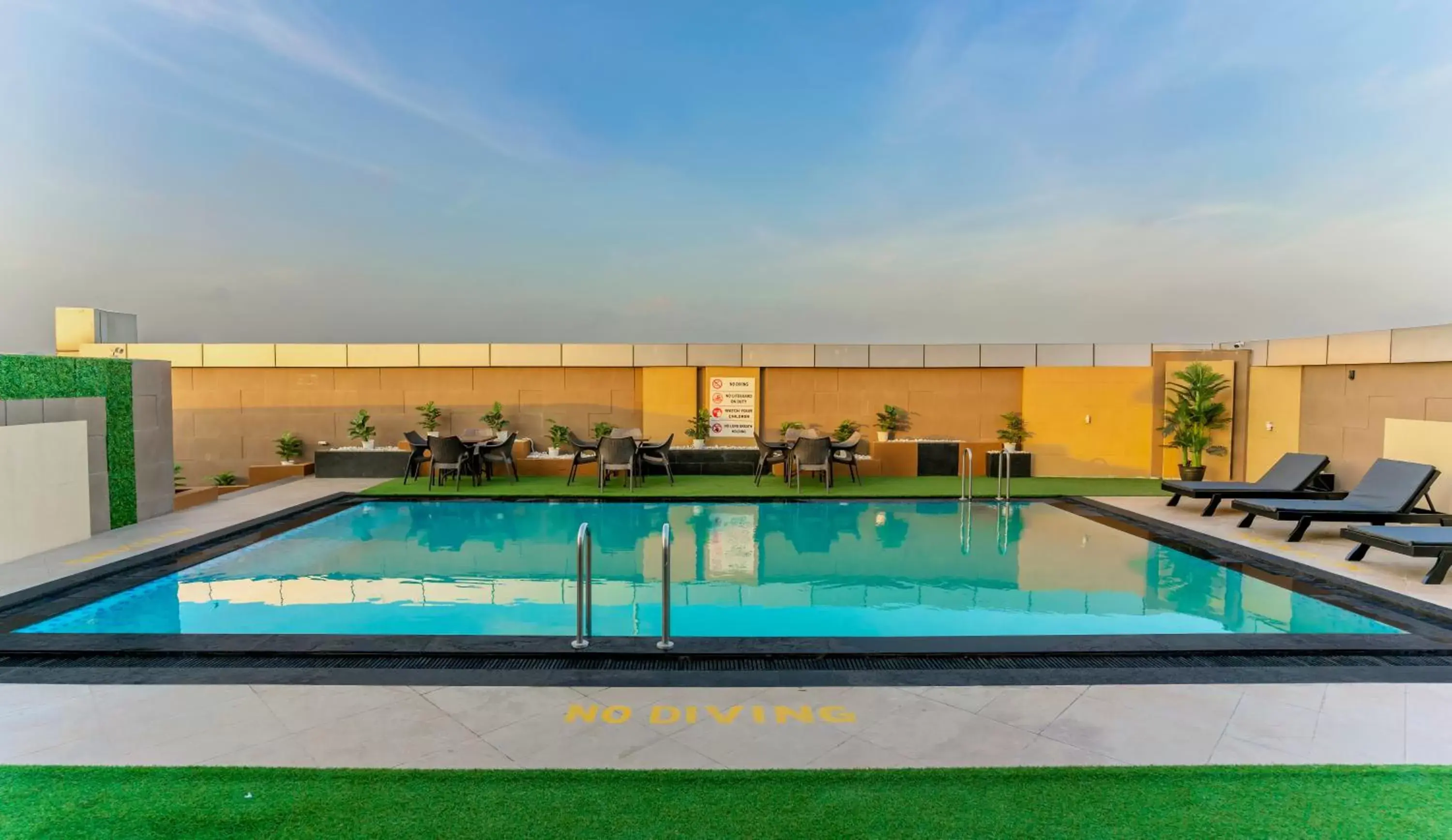 Balcony/Terrace, Swimming Pool in Radisson Udaipur