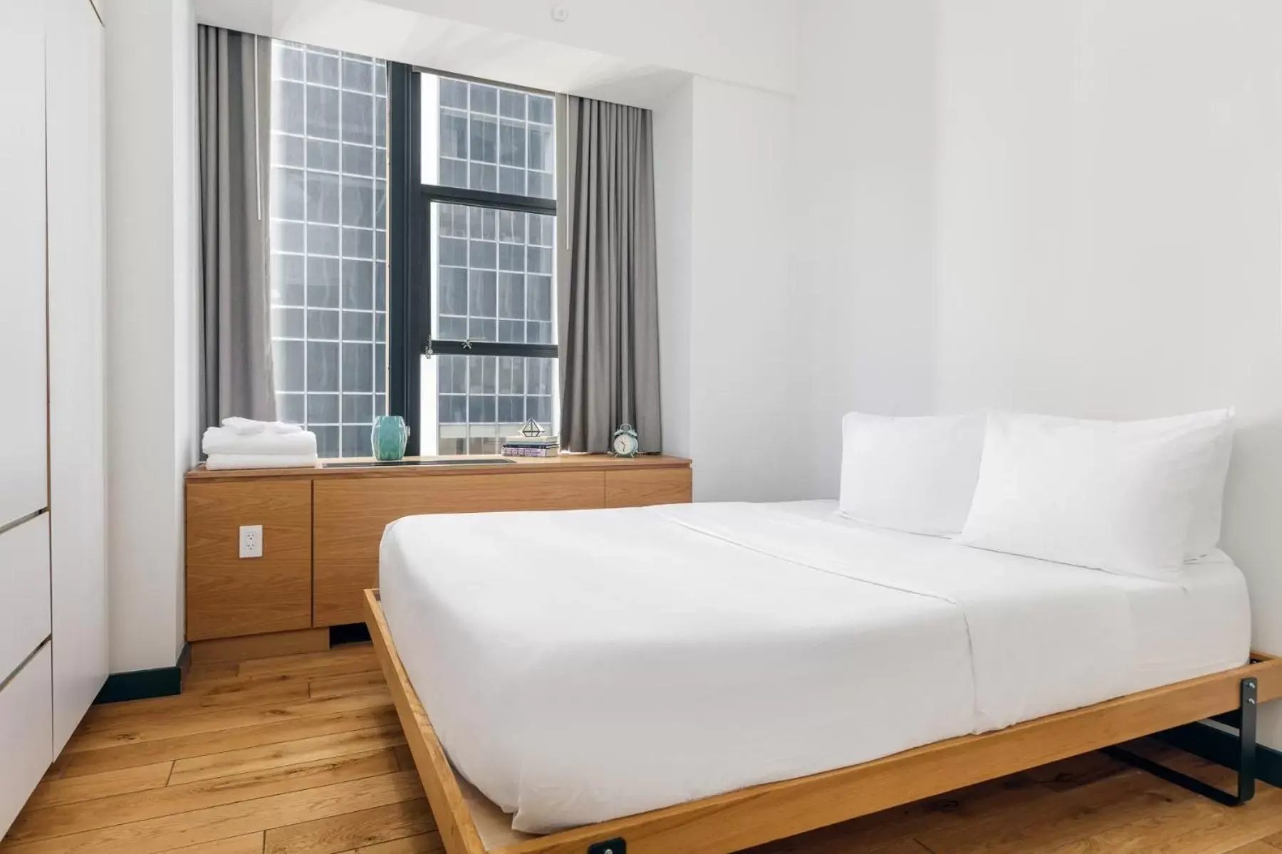Bed in Placemakr Wall Street