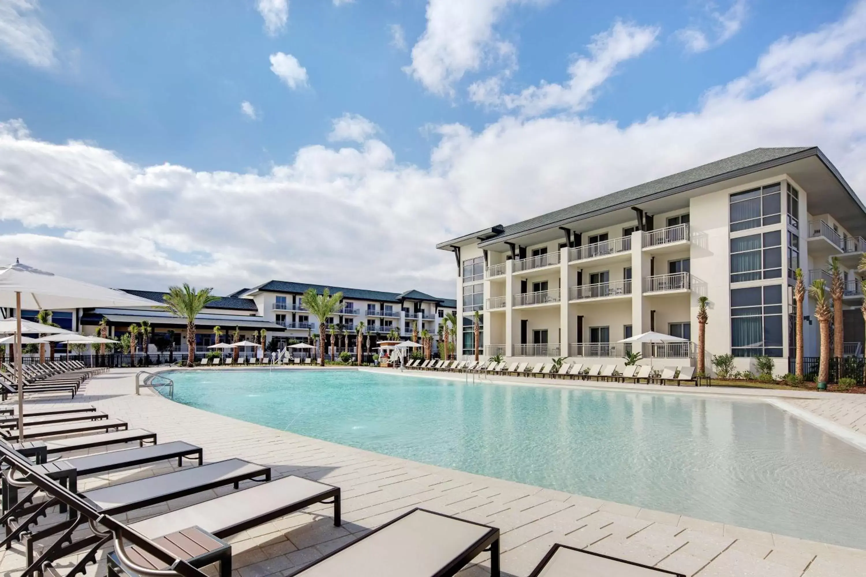 Property building, Swimming Pool in Embassy Suites St Augustine Beach Oceanfront Resort