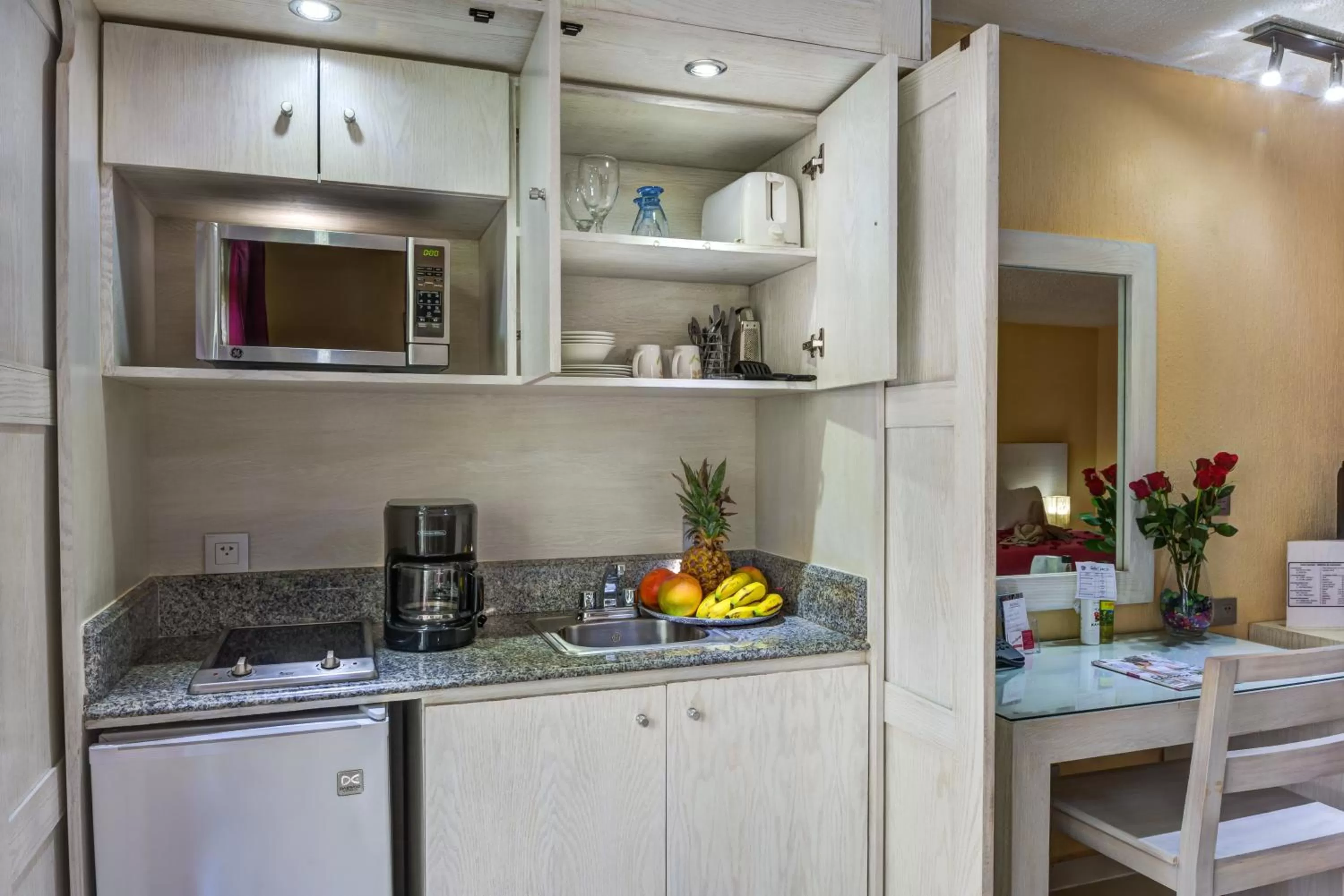 Kitchen or kitchenette in Suites Corazon