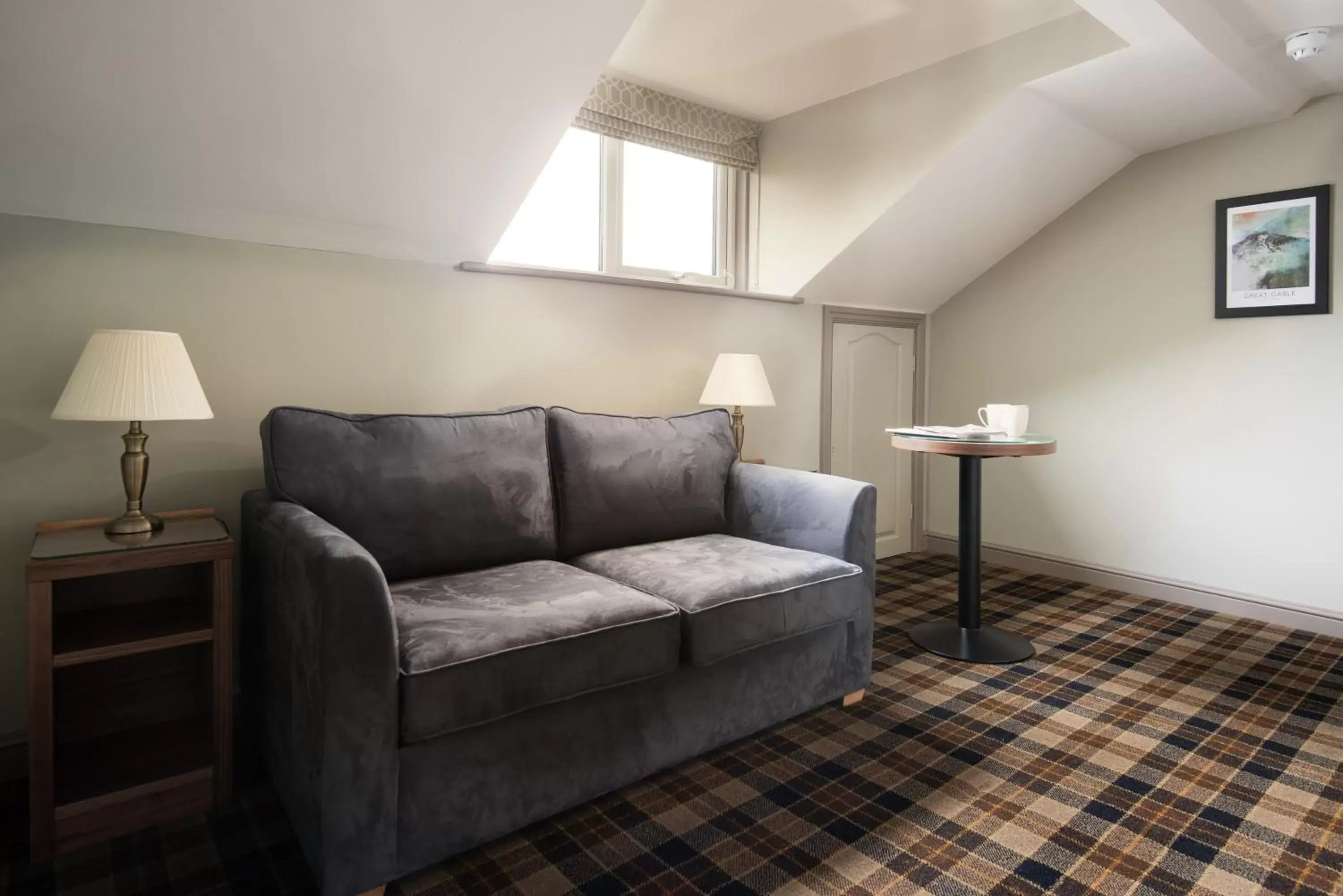 Bedroom, Seating Area in The Angel Inn - The Inn Collection Group